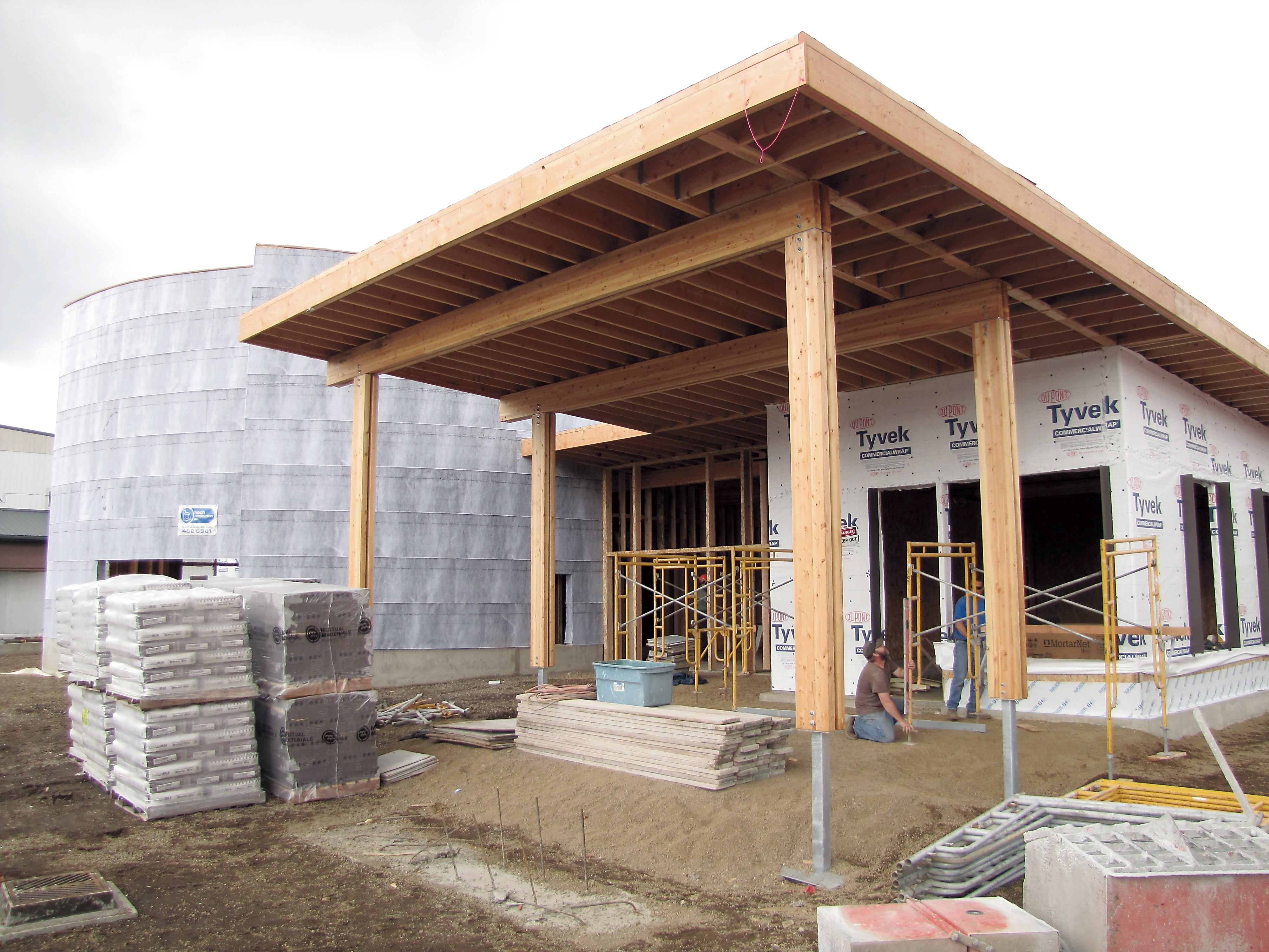 Forks’ $2.64 million Rainforest Arts Center is now getting its exterior masonry work. —Photo by Arwyn Rice/Peninsula Daily News