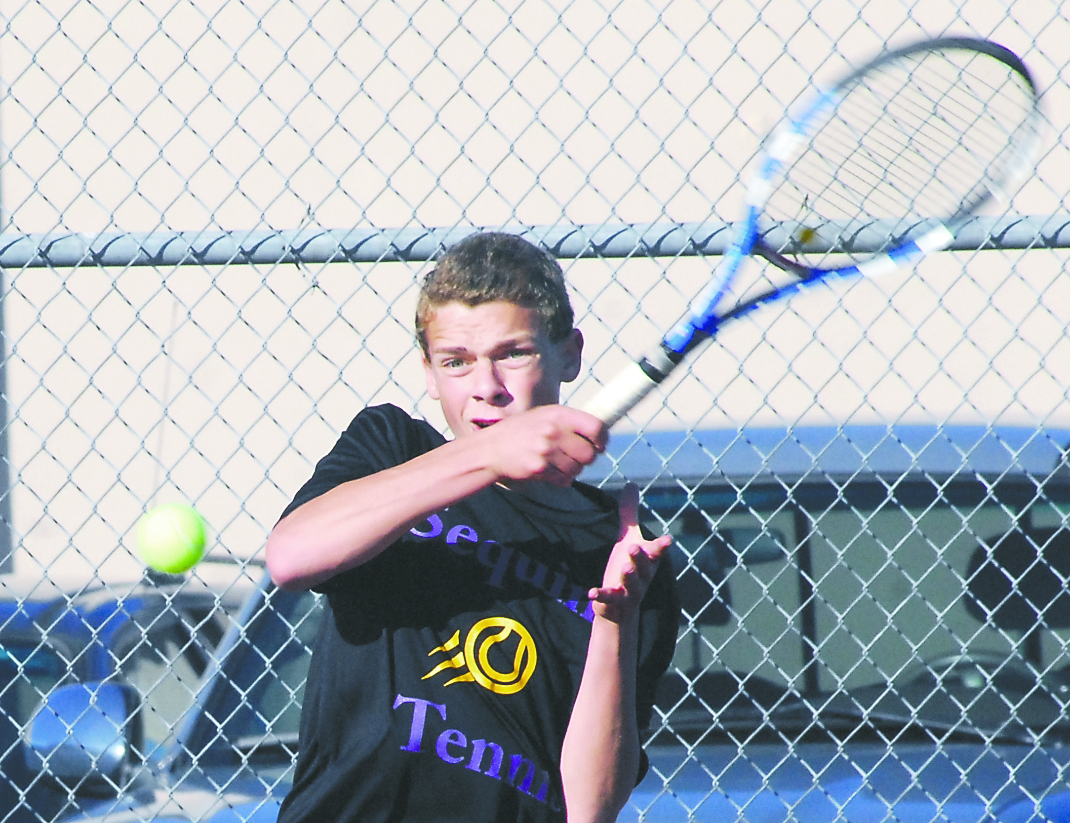 Sequim's Eli Berg returns a serve from Klahowya's Jerry Landram during the No. 1 singles match at Sequim High School. Keith Thorpe/Peninsula Daily News