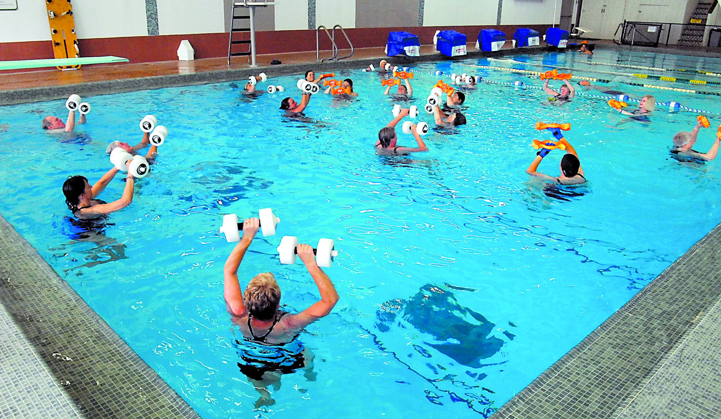 Water aerobics class participants exercise in the diving pool at William Shore Memorial Pool in Port Angeles in August. The pool will celebrate its 50th anniversary with an open swim this weekend. Keith Thorpe/Peninsula Daily News