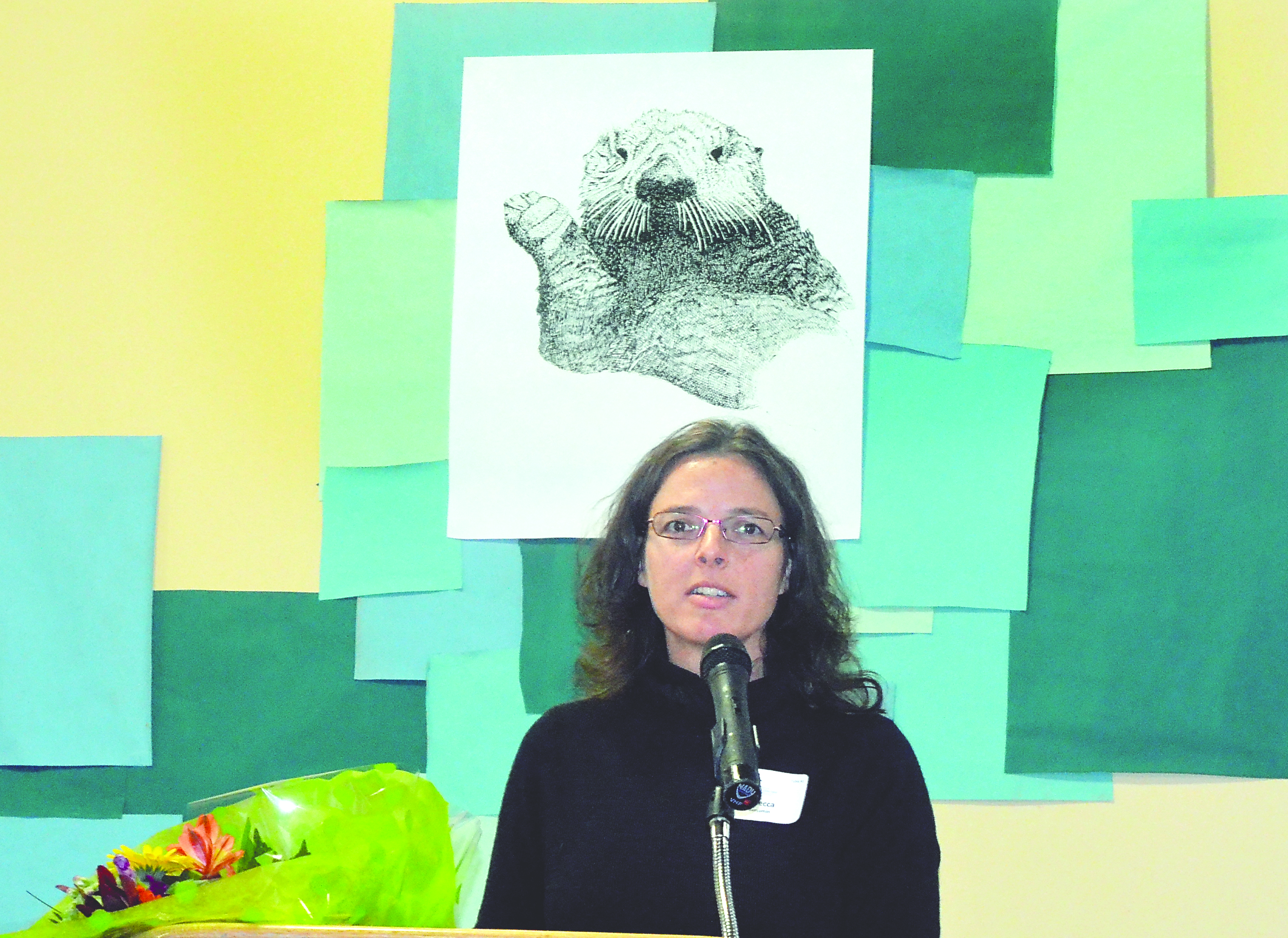 Rebecca Benjamin addresses the audience Thursday after receiving the 2013 Eleanor Stopps Environmental Leadership Award.  -- Photo by Charlie Bermant/Peninsula Daily News