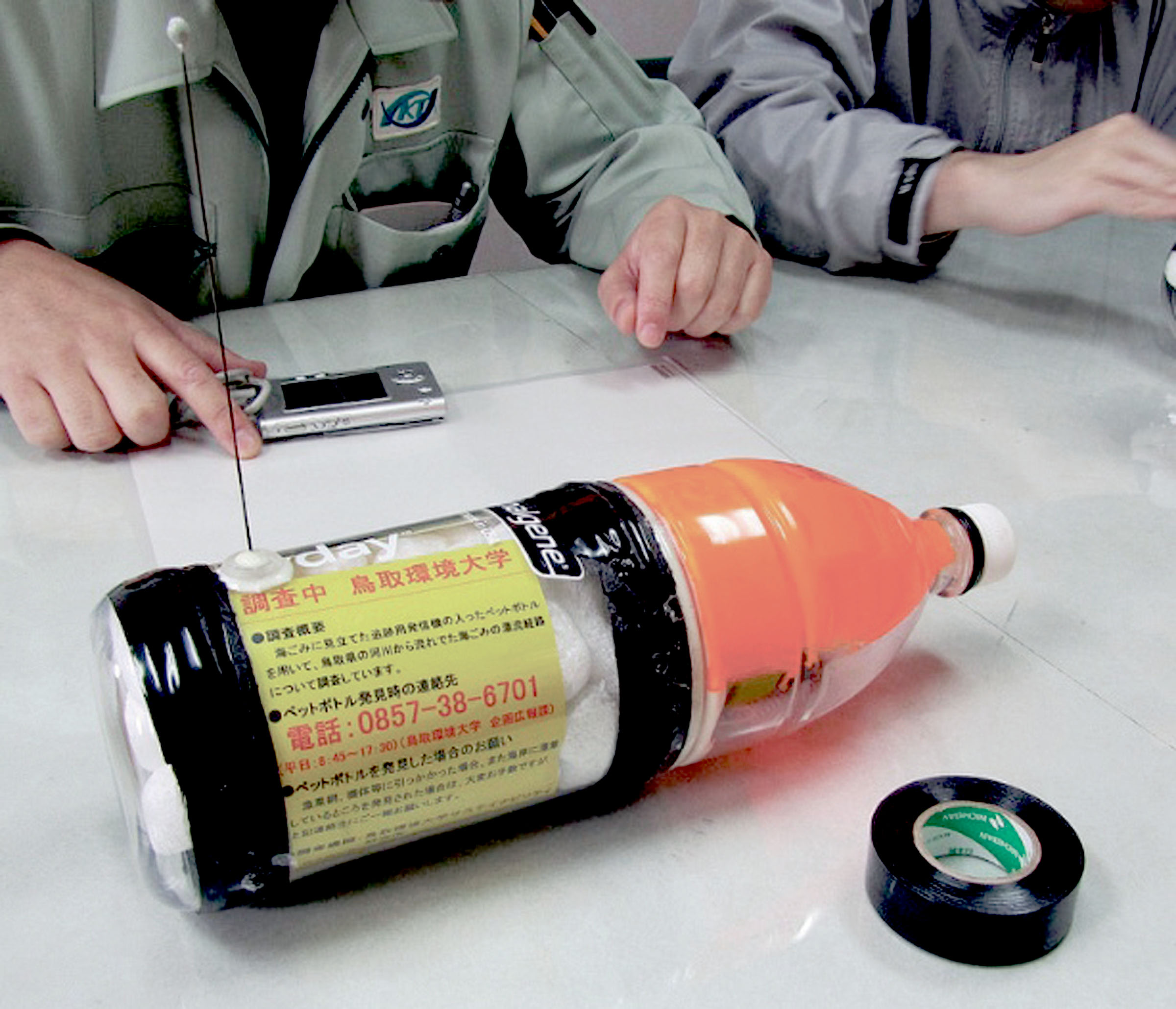 This photo from Oregon State University shows a soda-bottle-like transponder.