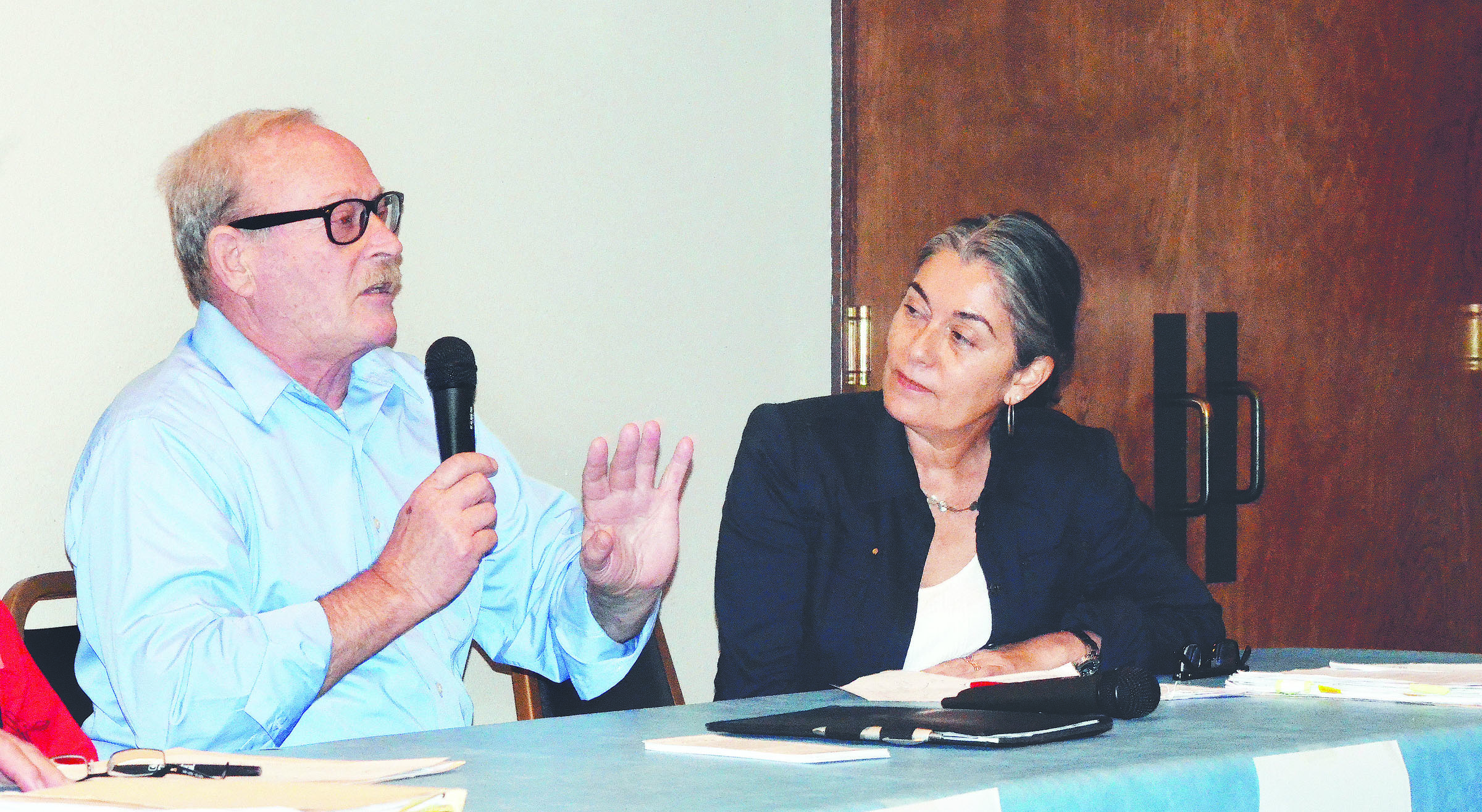 Position 1 City Council candidates Bob Jauntz and Michelle Sandoval.  -- Photo by Charlie Bermant/Peninsula Daily News