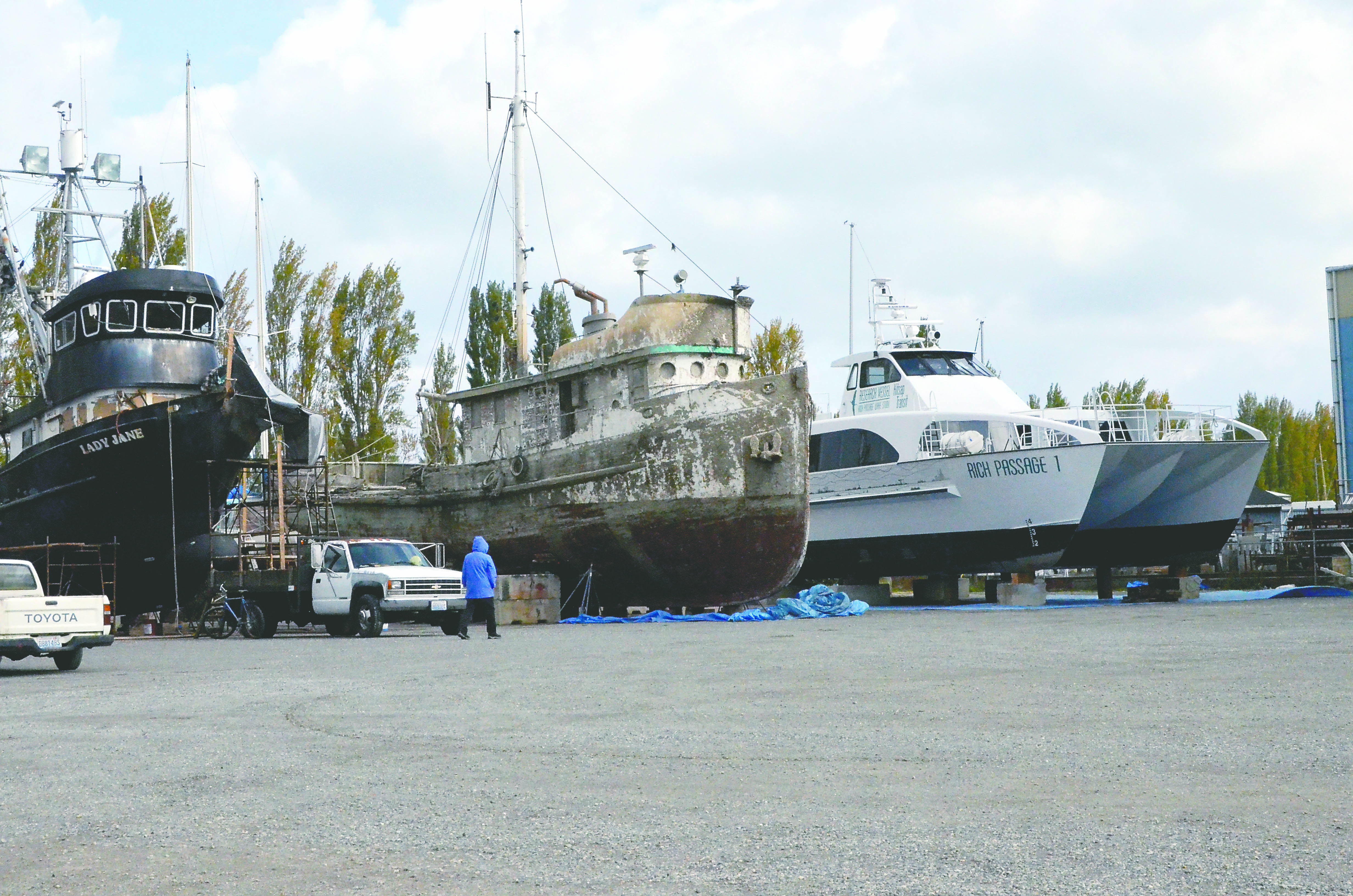 The untouched Western Flyer sits distinctively among its neighbors in the Port of Port Townsend boatyard.  -- Photo by Charlie Bermant/Peninsula Daily News