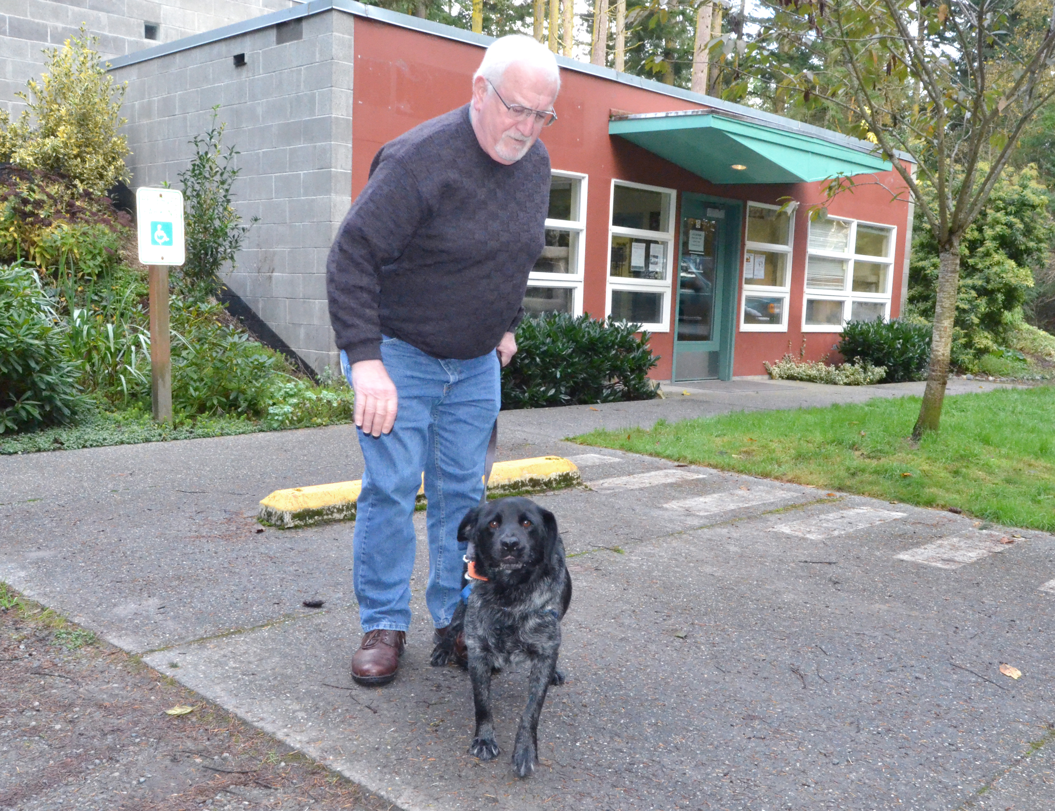 Jefferson County Animal Control Officer Alex Mintz takes Zeke