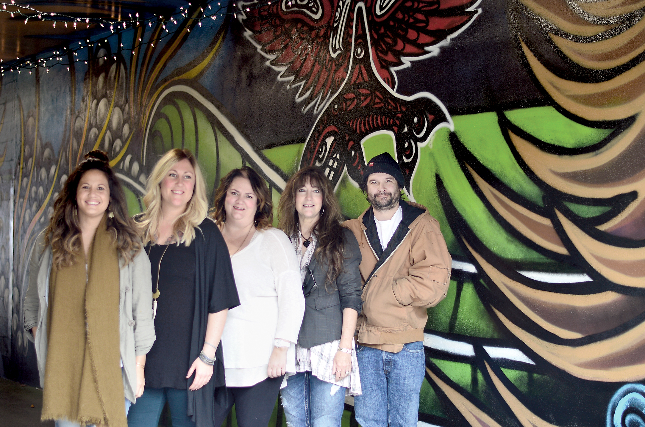 In the now-lit First Street breezeway in Port Angeles are the planners of Novemberfest