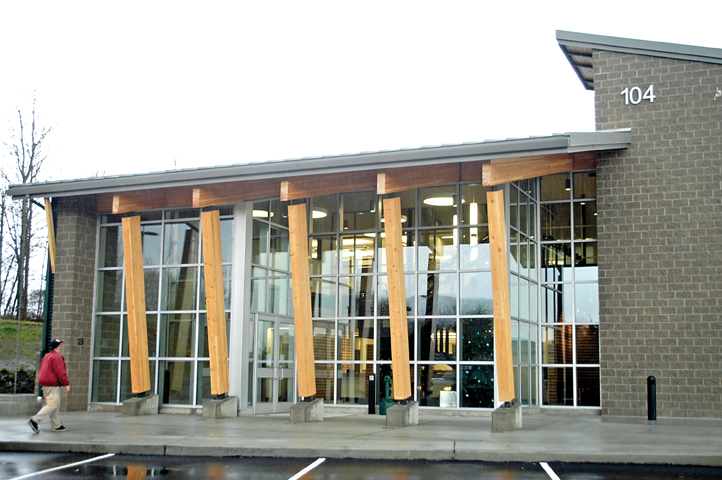 A customer walks into the Clallam County Public Utility District's new administrative office in Carlsborg on Thursday. The public is invited to a ribbon-cutting ceremony at 10 a.m. Saturday. Chris McDaniel/Peninsula Daily News