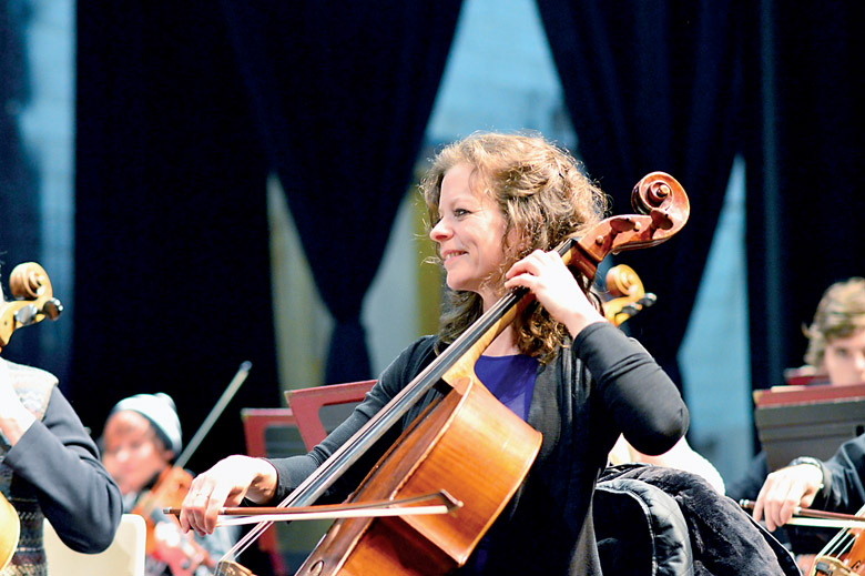 Port Angeles Symphony cellist Traci Winters will bring Christmas classics and then some to the Port Angeles High School Performing Arts Center on Saturday. Diane Urbani de la Paz/Peninsula Daily News