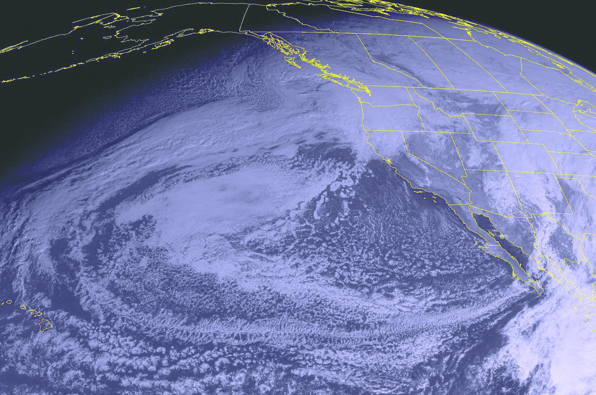 This NOAA satellite image taken Saturday at 10 a.m. Pacific time shows a large storm system continuing to impact the Pacific Northwest. This storm will bring heavy rain and snow showers to the area. Flooding is still possible for parts of Washington and Oregon. — The Associated Press
