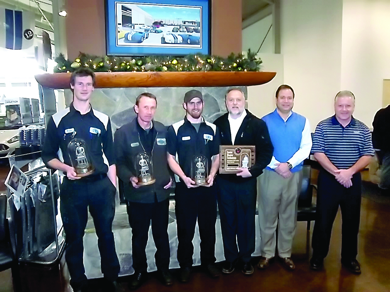 Three Price Ford/Lincoln service technicians recently attained senior master technician status. From left are senior master technicians Travis Bigelow