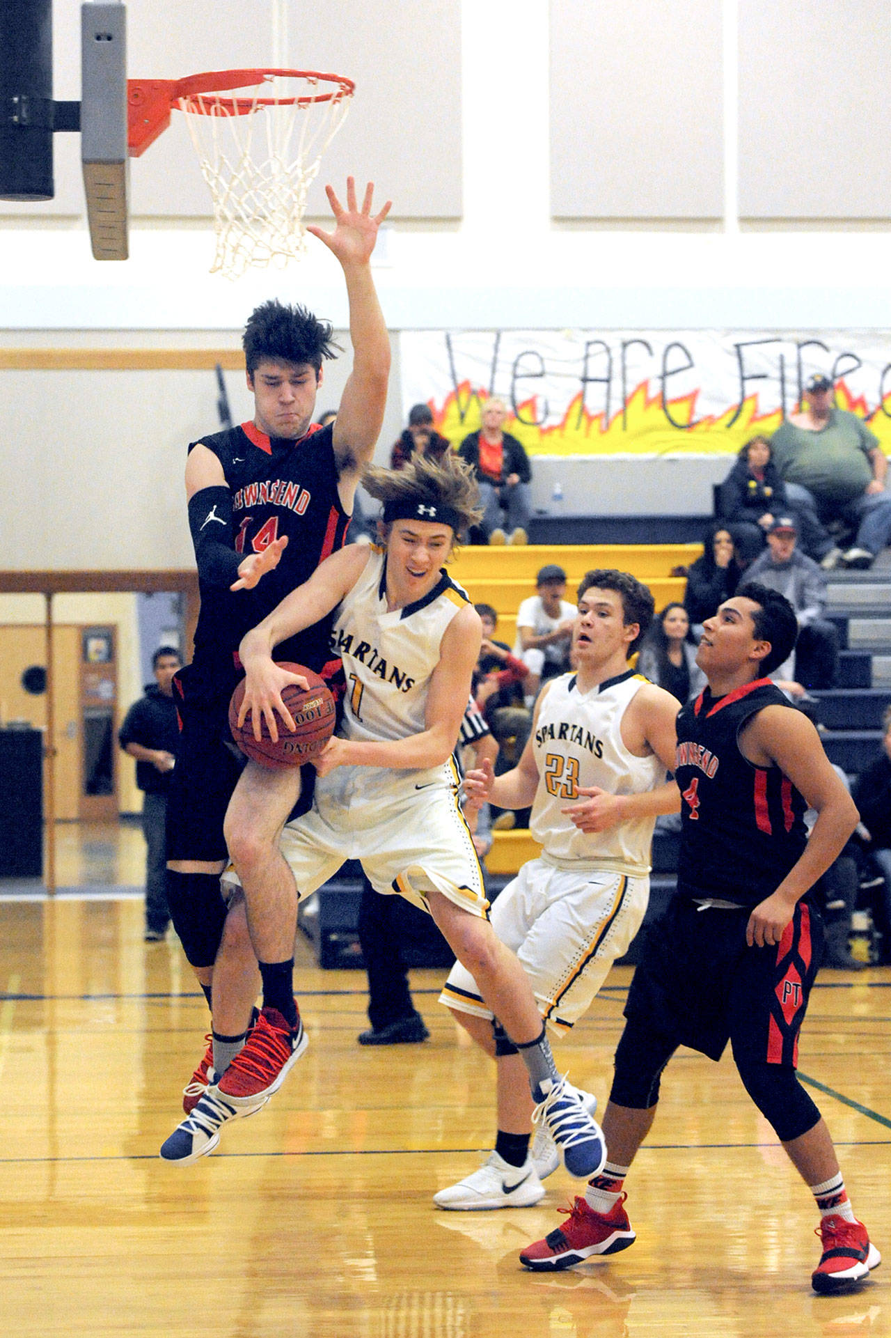 Lonnie Archibald/for Peninsula Daily News Forks Seth Johnson (1) controls the ball as he competes with Redhawk Noa Montoya (14). Also in on the action are Forks’ Braton Armas (23) and Port Townsend’s Jacob Boucher.