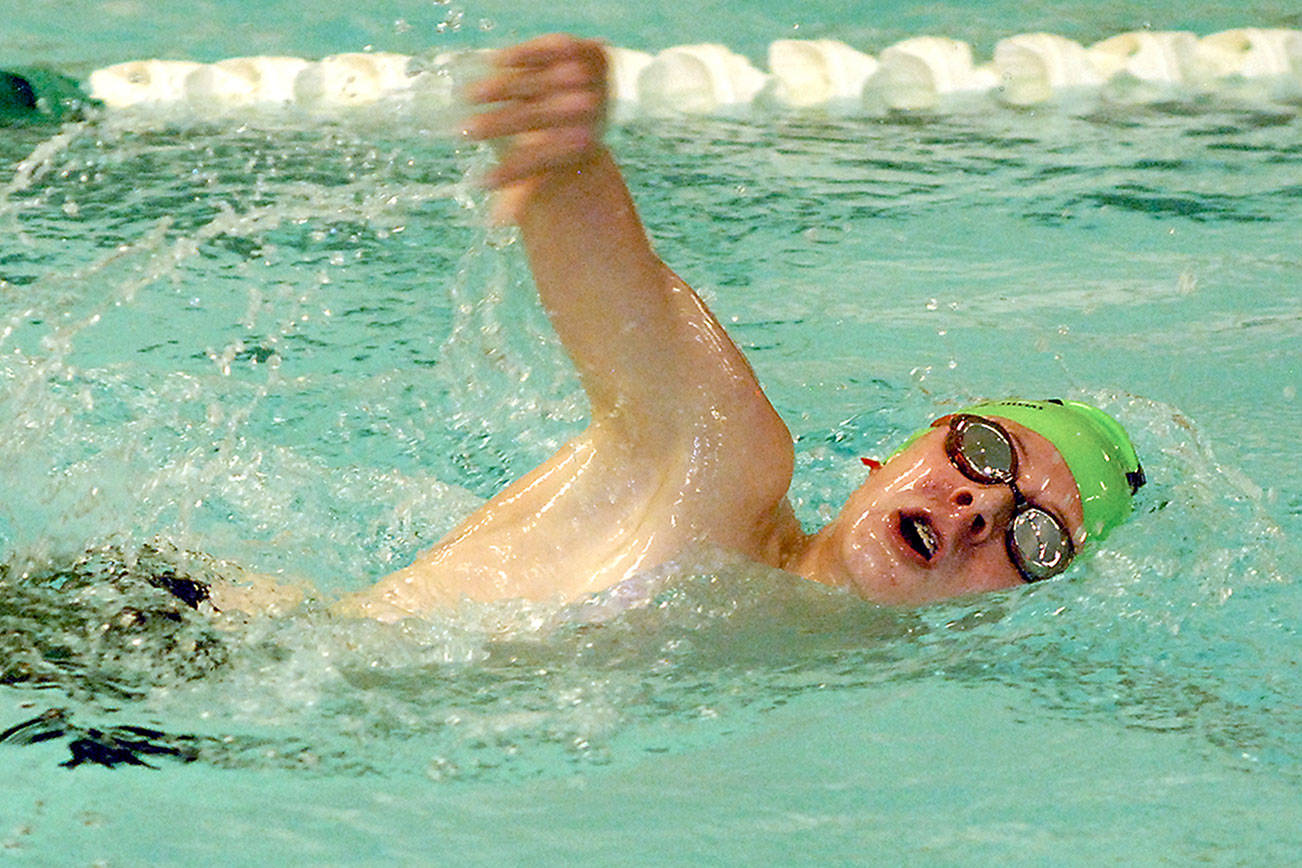 PREP SPORTS ROUNDUP: Trojans swim past Riders