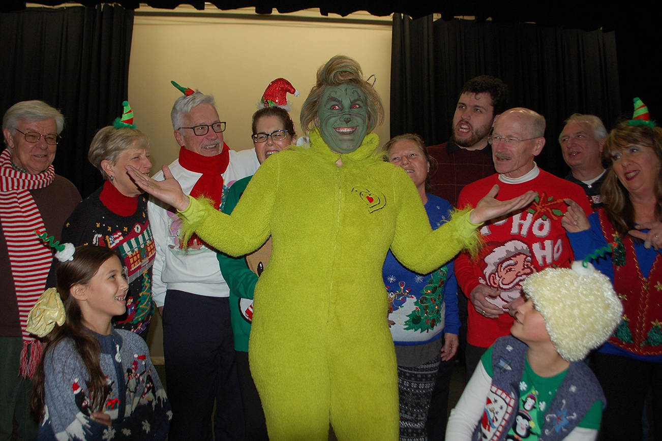 The cast of Olympic Theatre Arts’ “Holiday Variety Show” from bottom left, Danika Chen, Jennifer Horton and Hannah Colwell, and top left, Leroy Davidson, musical director Karen Pritchard, Greg Scherer, Lorra Cornetet, Cylinda McAlister, Ryan Machedo, Ken Lillagore, David Meissner and Debbie Embree rehearse one of the scenes from its upcoming production set for this weekend. (Erin Hawkins/Olympic Peninsula News Group)