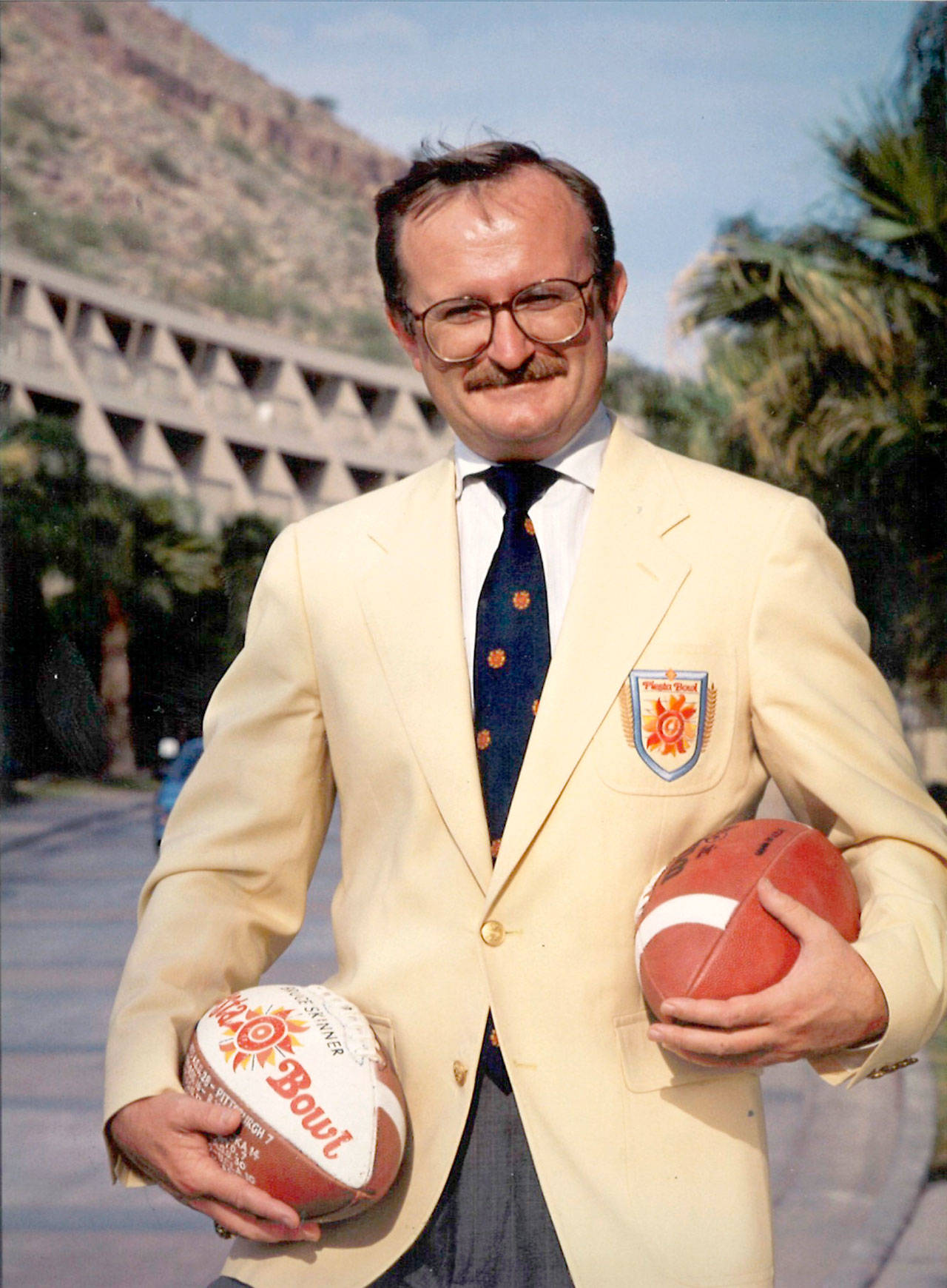 Port Angeles’ Bruce Skinner served as executive director of the Fiesta Bowl from 1980-1990, ushering in changes that altered the sports landscape to this day. The Washington Huskies will make their inaugural appearance in the bowl when they take on Penn State on Saturday.