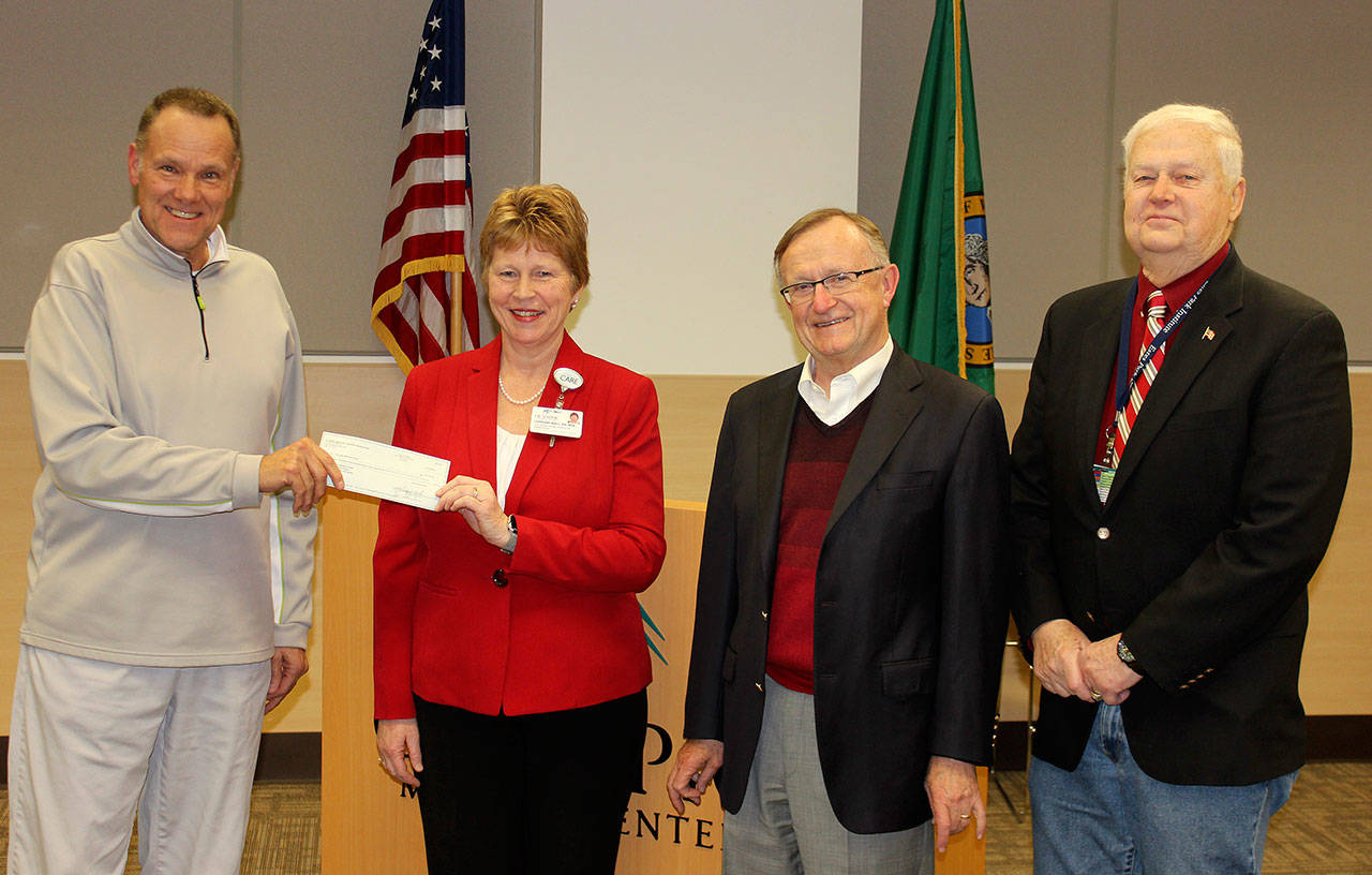 Pictured, from left, are Jim Jones, Olympic Medical Center Foundation president; OMC Chief Nursing Officer Lorraine Wall; OMC Foundation Executive Director Bruce Skinner and Jim Leskinovitch, OMC Board of Commissioners chair.