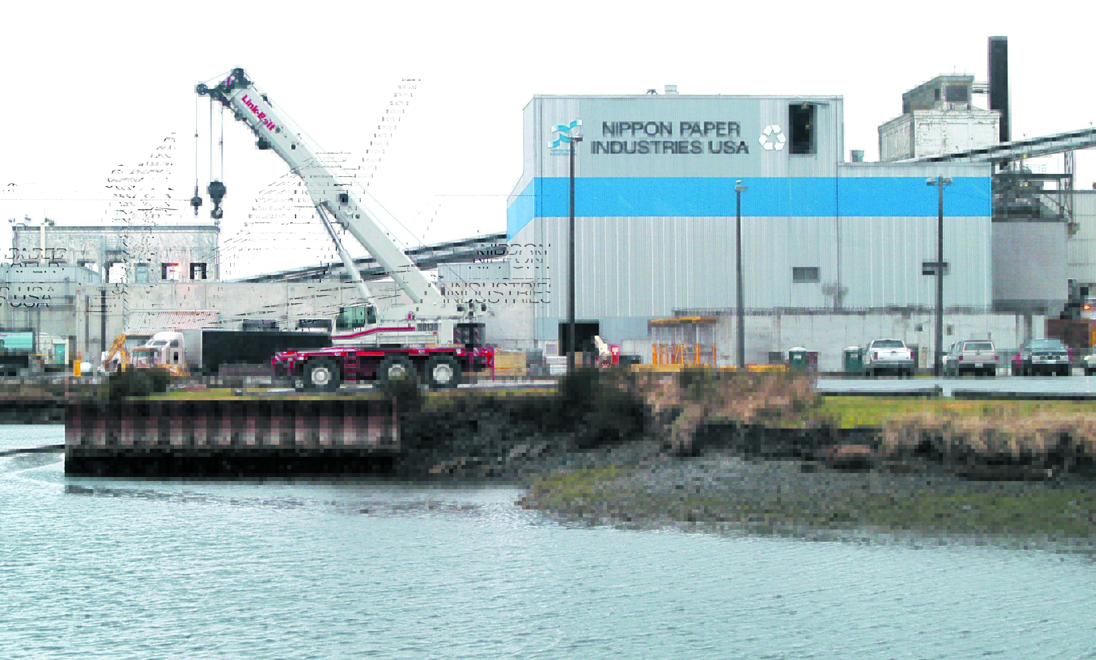 A construction crane sits near the lagoon at the Nippon Paper Industries USA mill in Port Angeles on Friday. Construction of a cogeneration plant  under way at the paper mill has forced organizers of the annual Duck Derby to find an alternate location for the event. Keith Thorpe/Peninsula Daily News