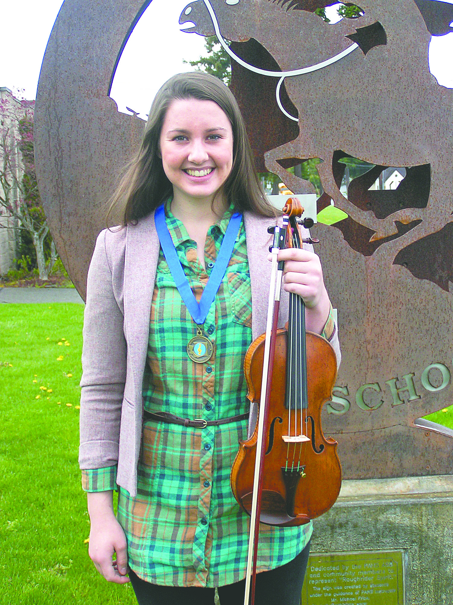 Erin Hennessey is state champion violinist and concertmaster of the state champion Port Angeles High School Chamber Orchestra.