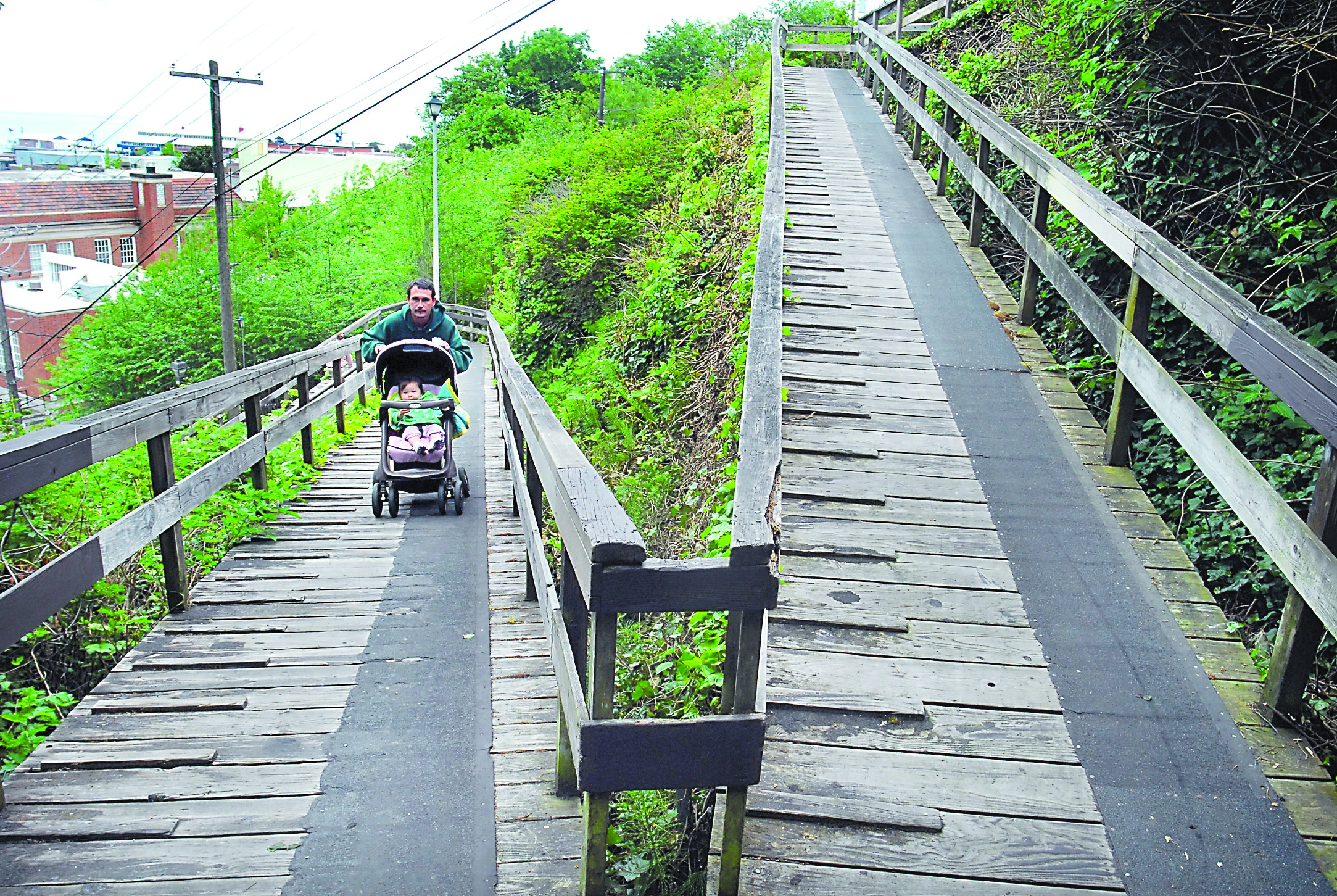 Joseph Kenney of Port Angeles pushes his daughter