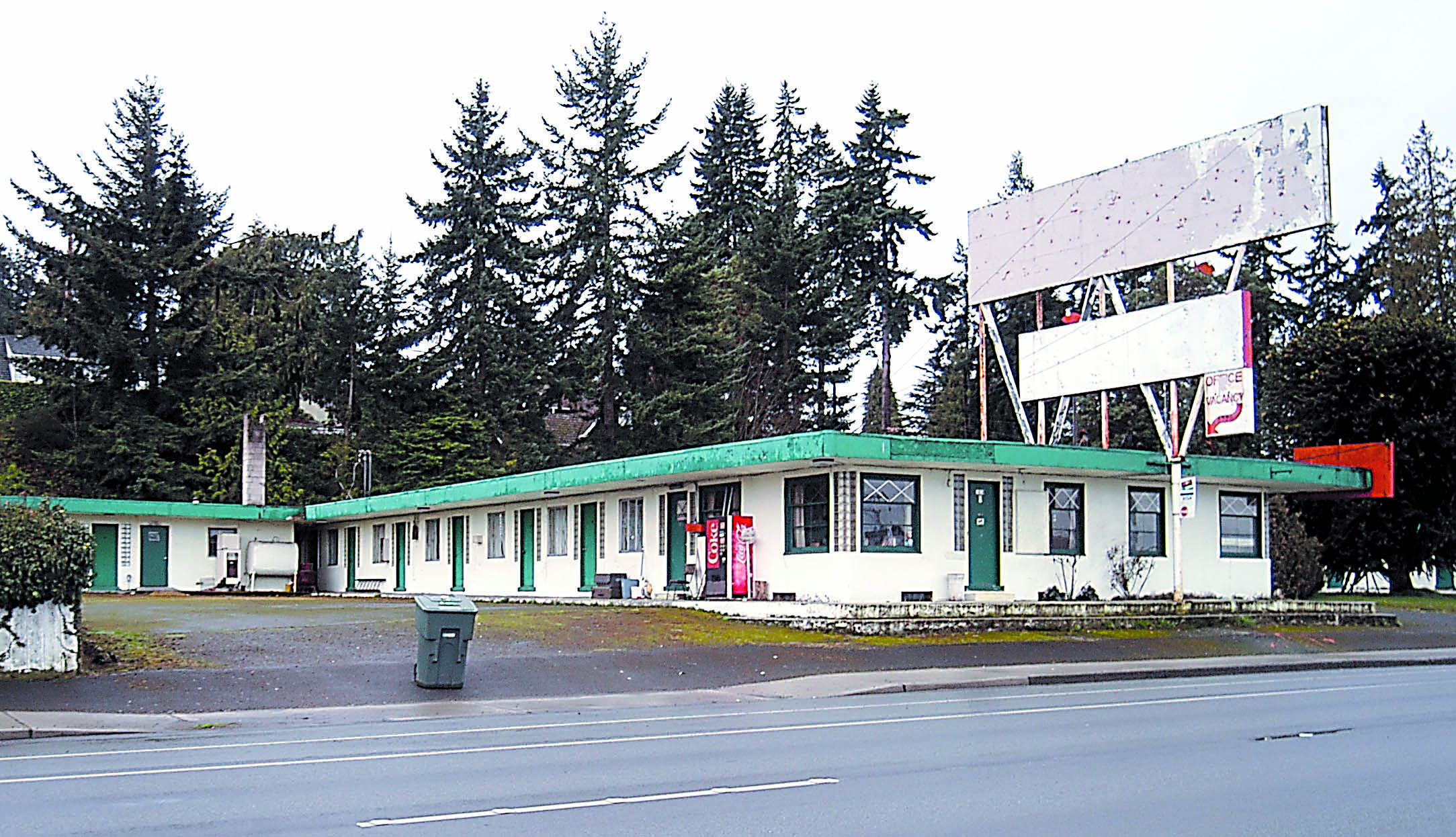 The shuttered Chinook Motel — its large sign whited out — sits depilated at the corner of First and Ennis streets in Port Angeles.  -- Photo by Keith Thorpe/Peninsula Daily News