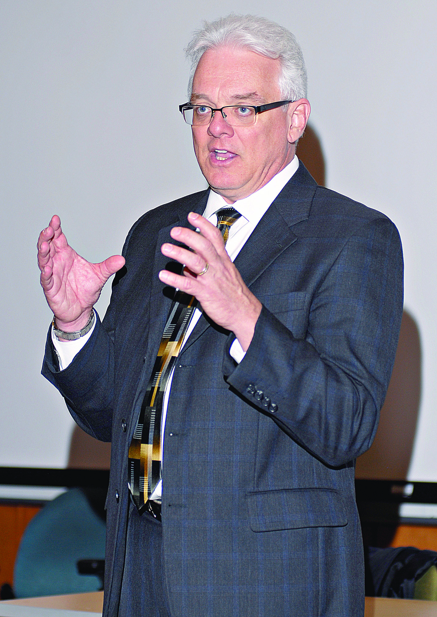 Luke P. Robins addresses an audience during his visit to the North Olympic Peninsula last month. The Louisiana academician has been selected as Peninsula College’s sixth president.  -- Peninsula Daily News photo