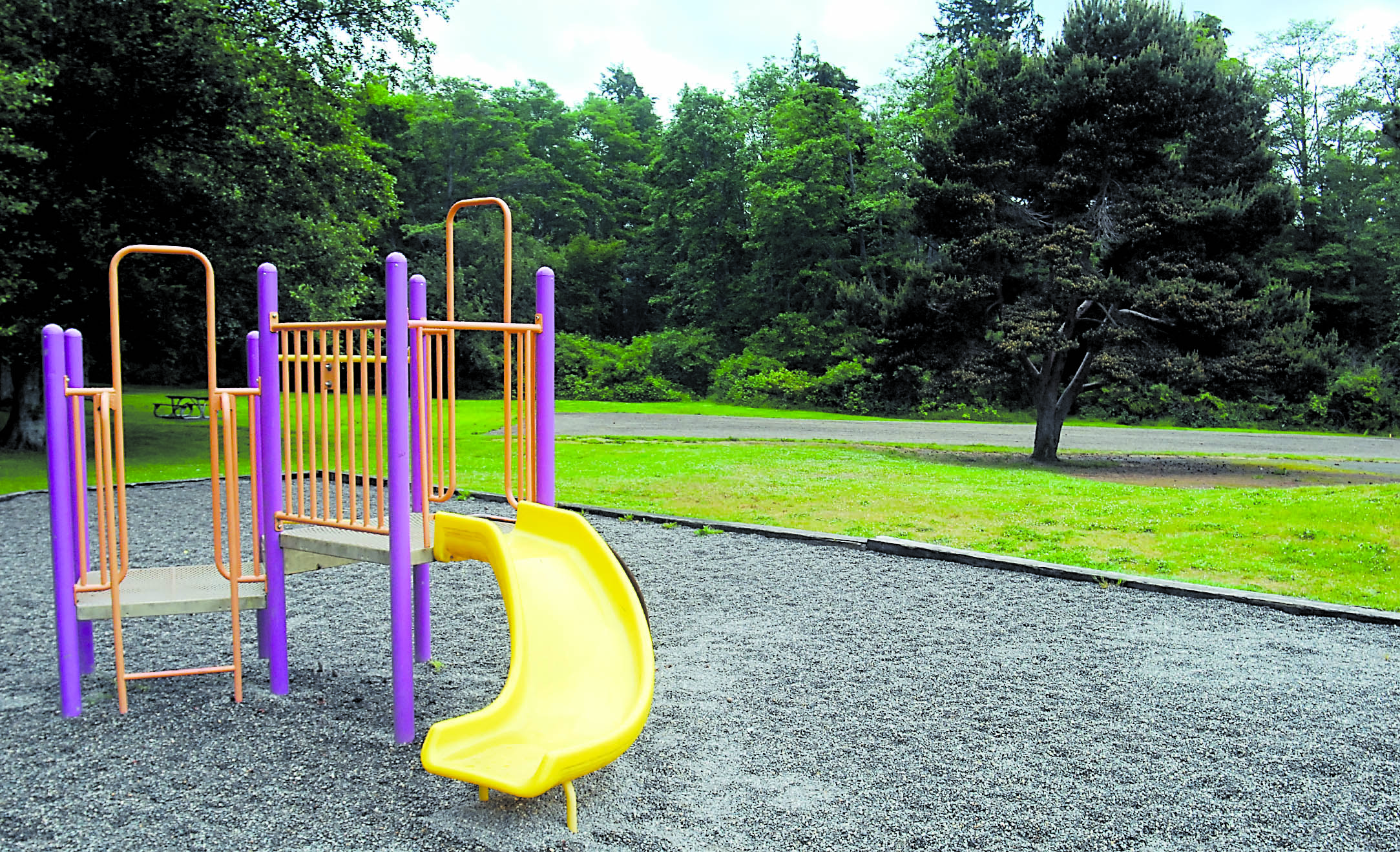 A piece of playground equipment sits near the leveled site of a new playground at Shane Park in Port Angeles. Keith Thorpe/Peninsula Daily News
