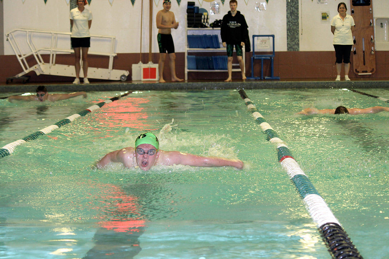 Patty Reifenstahl Port Angeles’ Henry Shaw swims the 100 butterfly against Klahowya during a meet at William Shore Memorial Pool on Thursday.                                Port Angeles’ Henry Shaw swims the 100 butterfly against Klahowya during a meet at William Shore Memorial Pool on Thursday.                                Patty Reifenstahl/photo