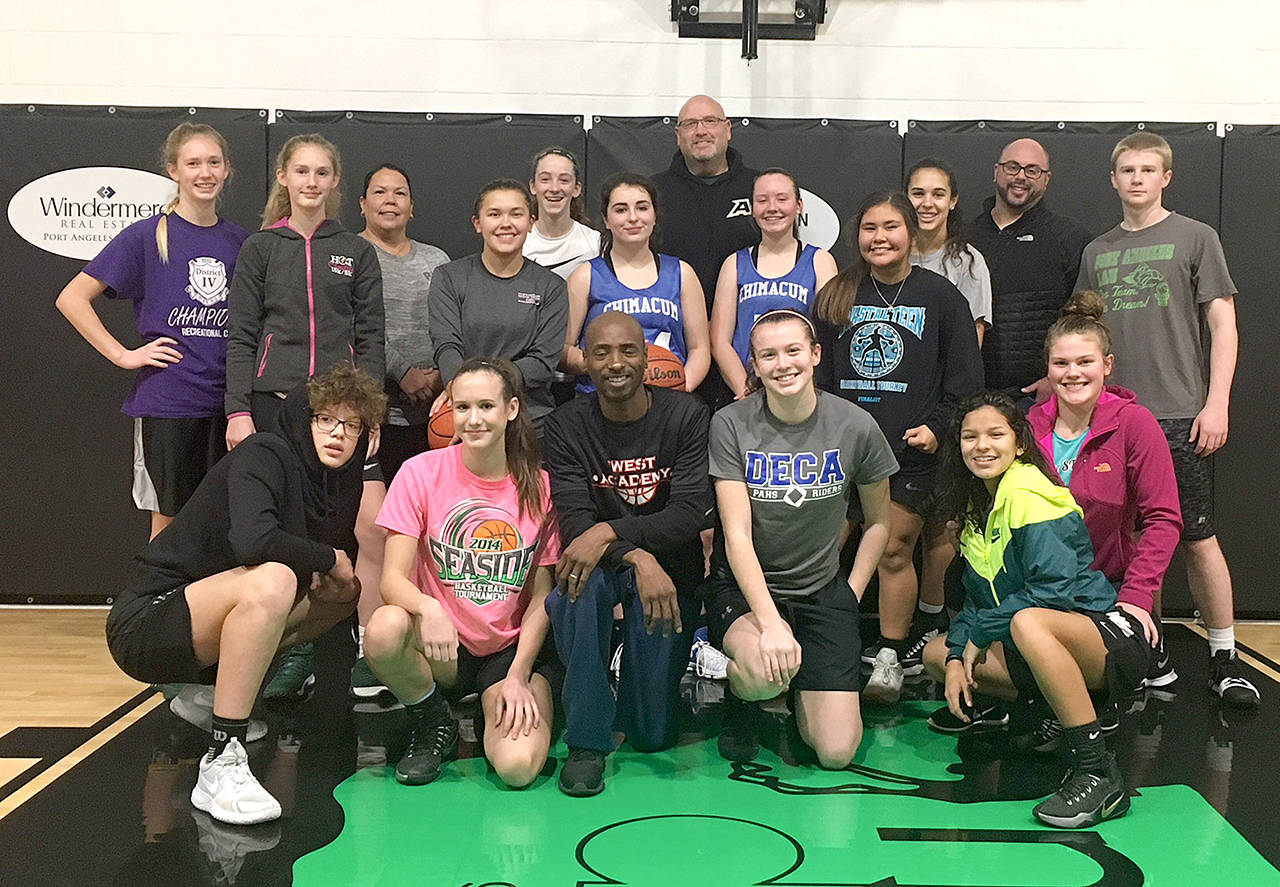 Jimmy Anderson of Olympia’s Anderson Athletics conducted 12 training sessions at The Warehouse Training Court this weekend working with more than 70 athletes from the Olympic Peninsula. Athletes and coaches pictured are: Gracie Long, Emilia Long, Madison Cooke, Neah Bay assistant coach Laurie McCaulley, Hannah Reetz, Gina McCaulley, Abby Schroeder, Jimmy Anderson, Savannah Huntingford, coach Mike Knowles, Katie Clark, Jaida Wood, Jazzlynn Yallup, Mia McNair, Camille Stensgard, Chimacum head coach Trevor Huntingford, Myra Walker and Brady Nickerson. (Joe Marvelle photo )