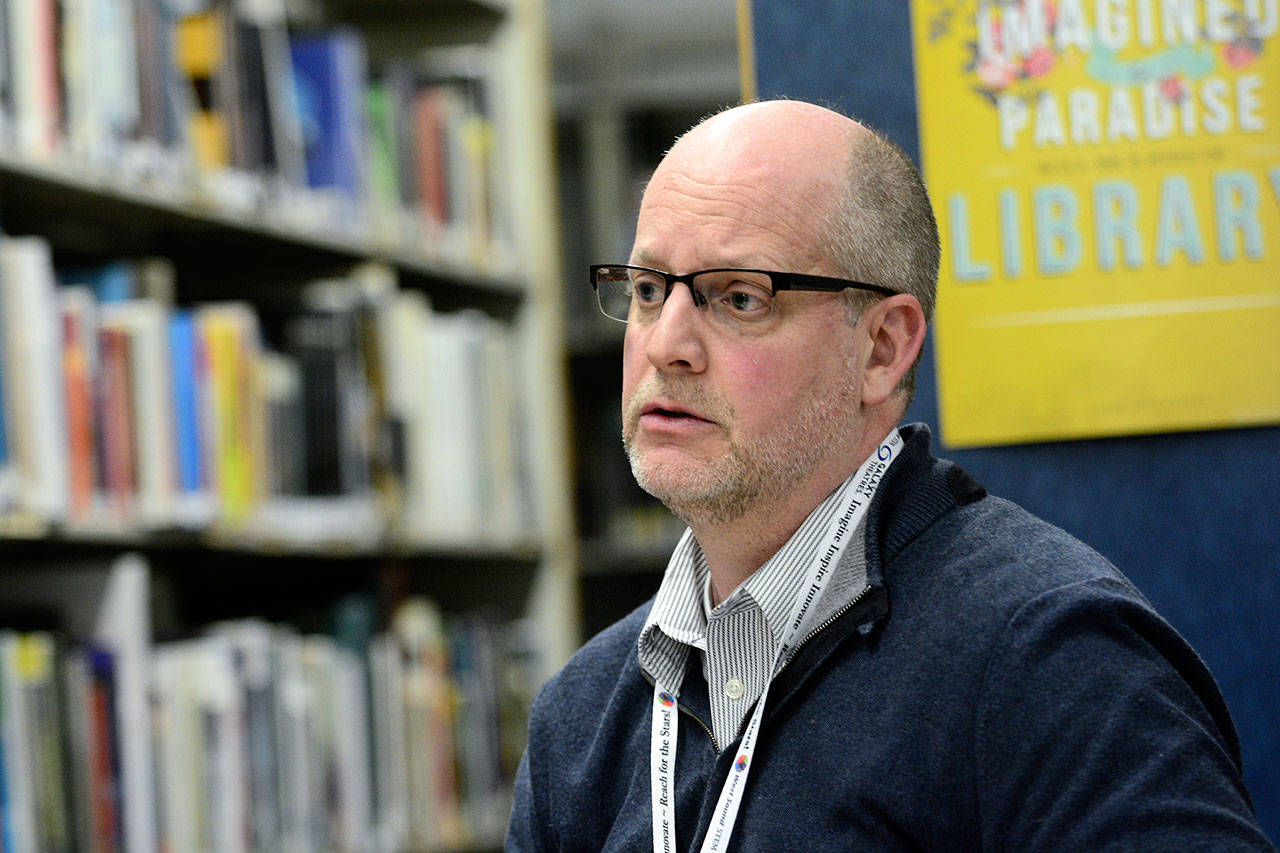 Chimacum School District Superintendent Rick Thompson addresses the school board during its meeting Wednesday night. (Jesse Major/Peninsula Daily News)