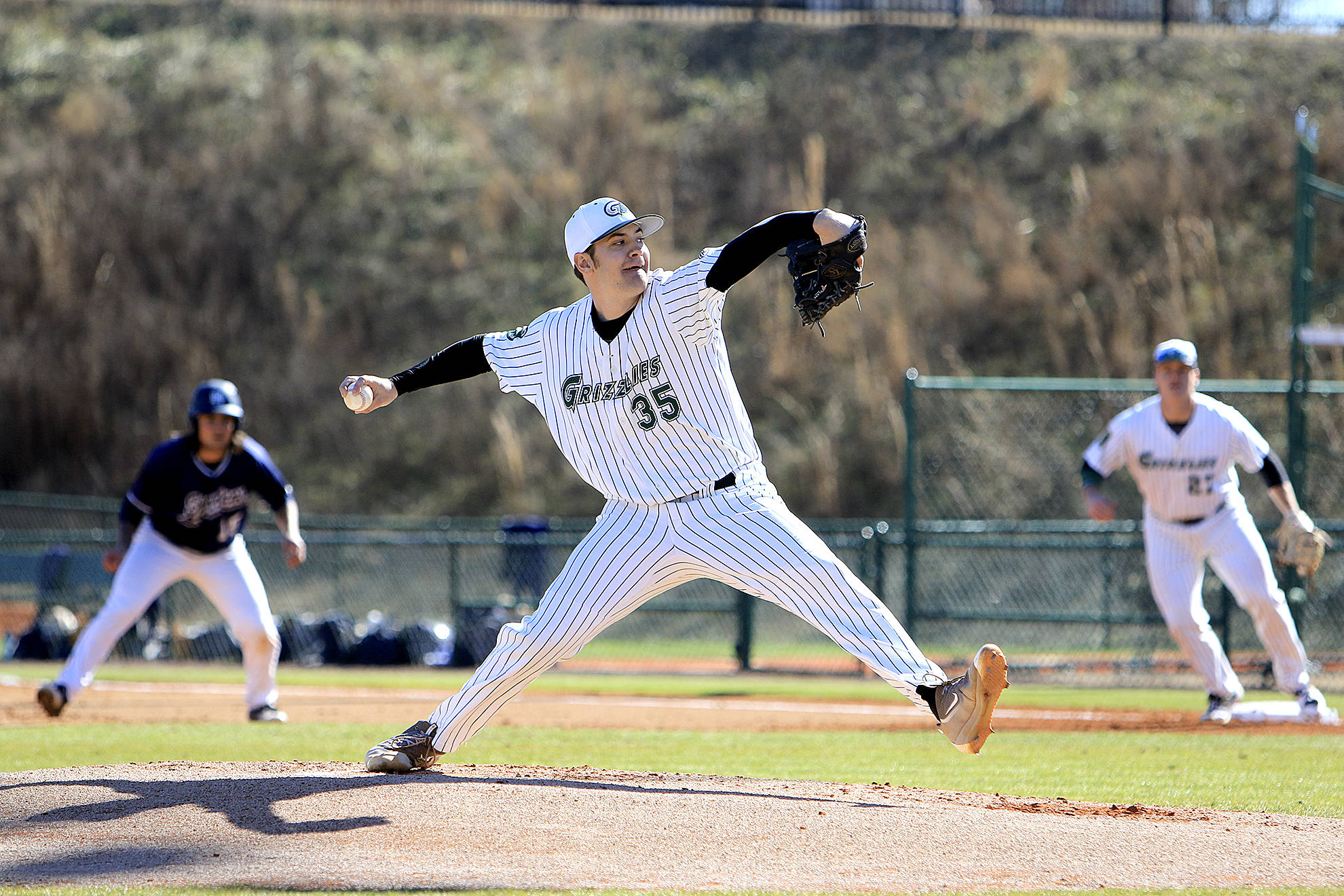 Port Angeles High School graduate Cole Uvila pitching for Georgia Gwinnett College.