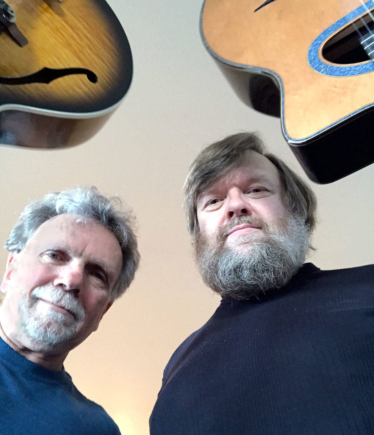 Local musicians Tony Petrillo, left, and Trevor Hanson, right, with special guest George Radebaugh will provide live music at AAUW’s Silent Auction on Saturday.