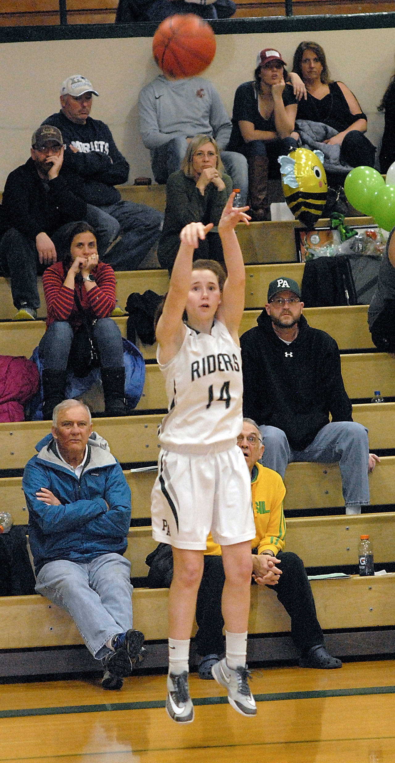 Keith Thorpe/Peninsula Daily News Port Angeles’ Delaney Wenzel shoots from outside the three-point line during a game against Olympic on Feb 1, in Port Angeles.