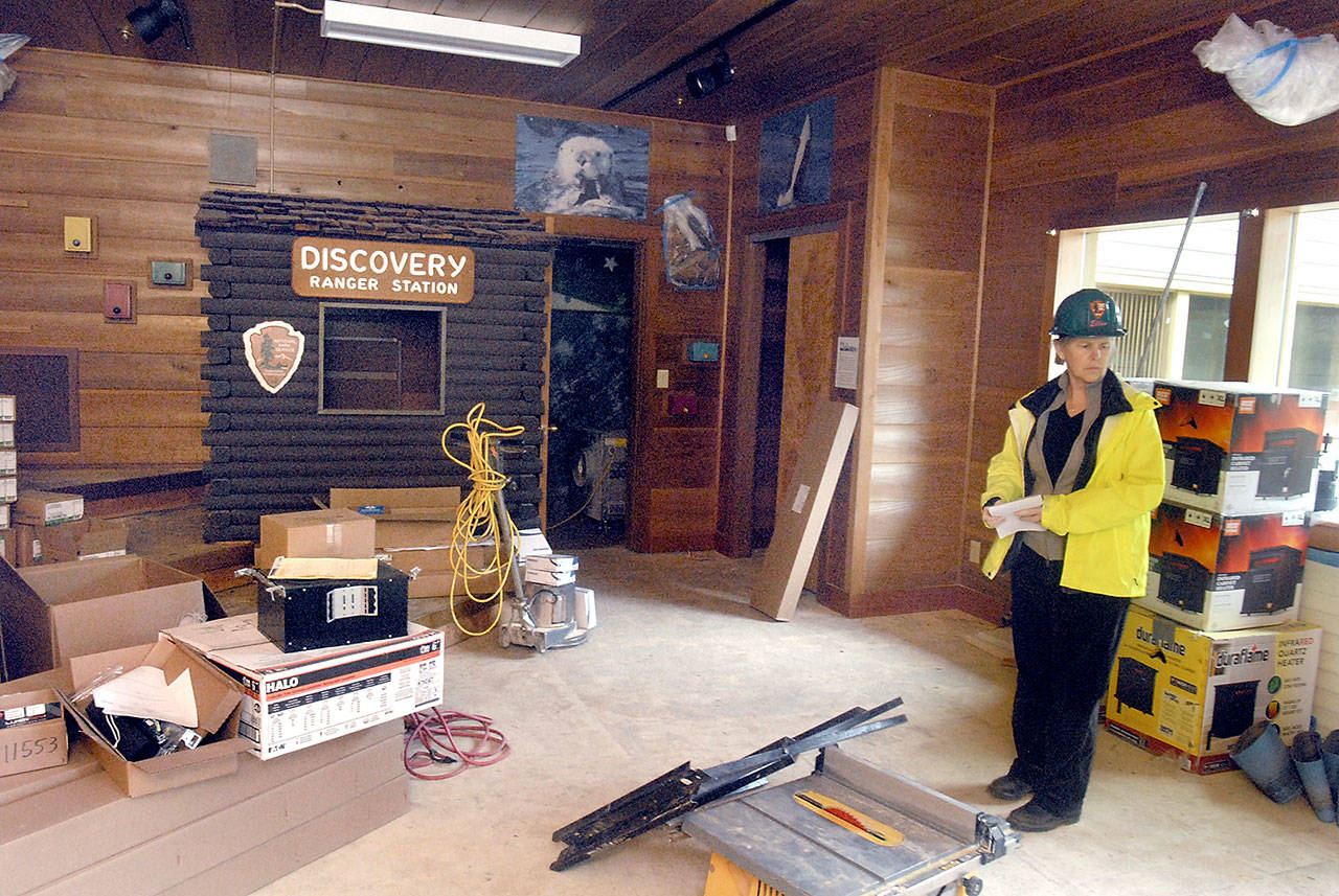 Olympic National Park historical architect Ellen Gage surveys work being done in the children’s Discovery Room in the park’s Port Angeles visitor center. (Keith Thorpe/Peninsula Daily News)