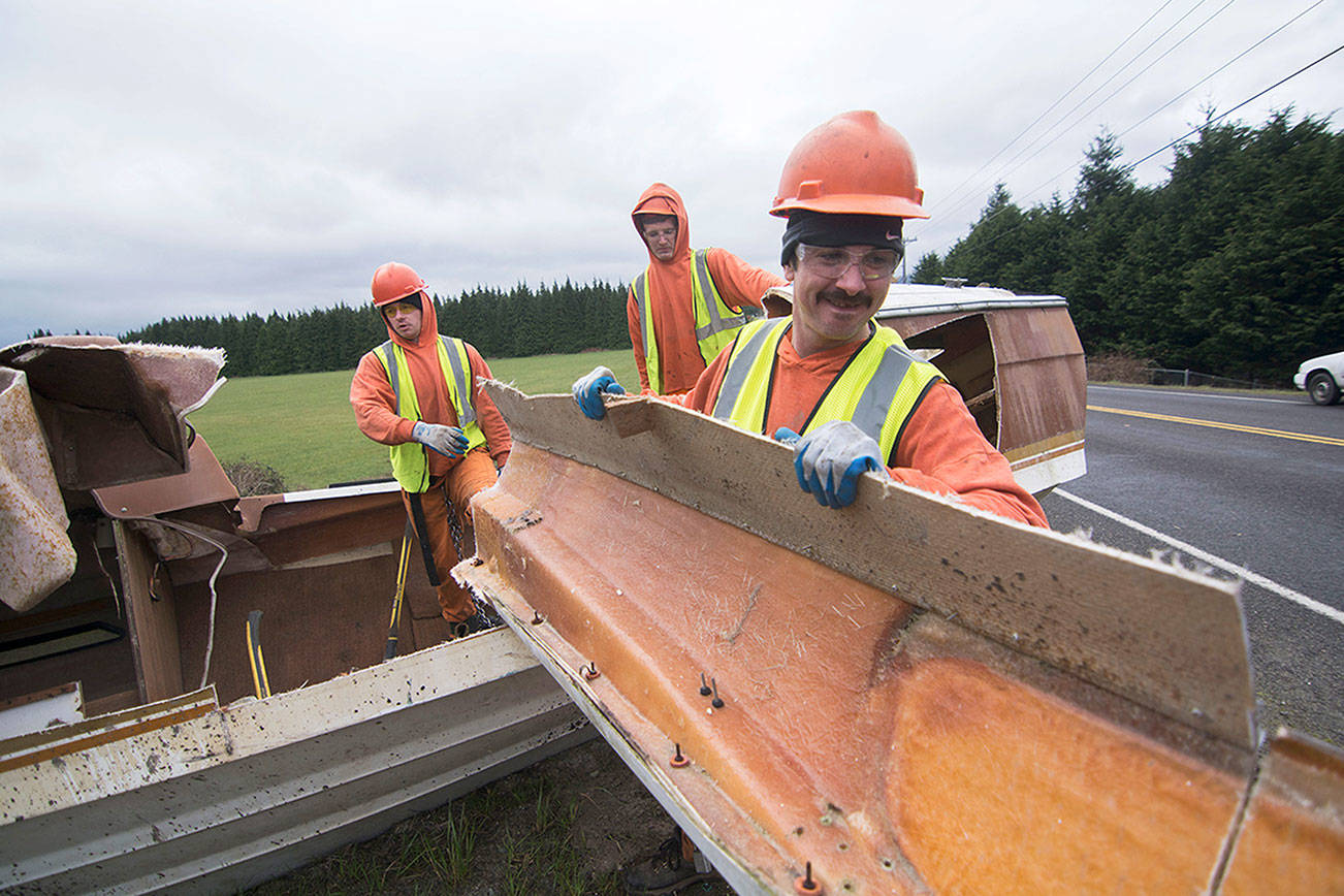 Chain Gang volunteers clean up while getting outdoors
