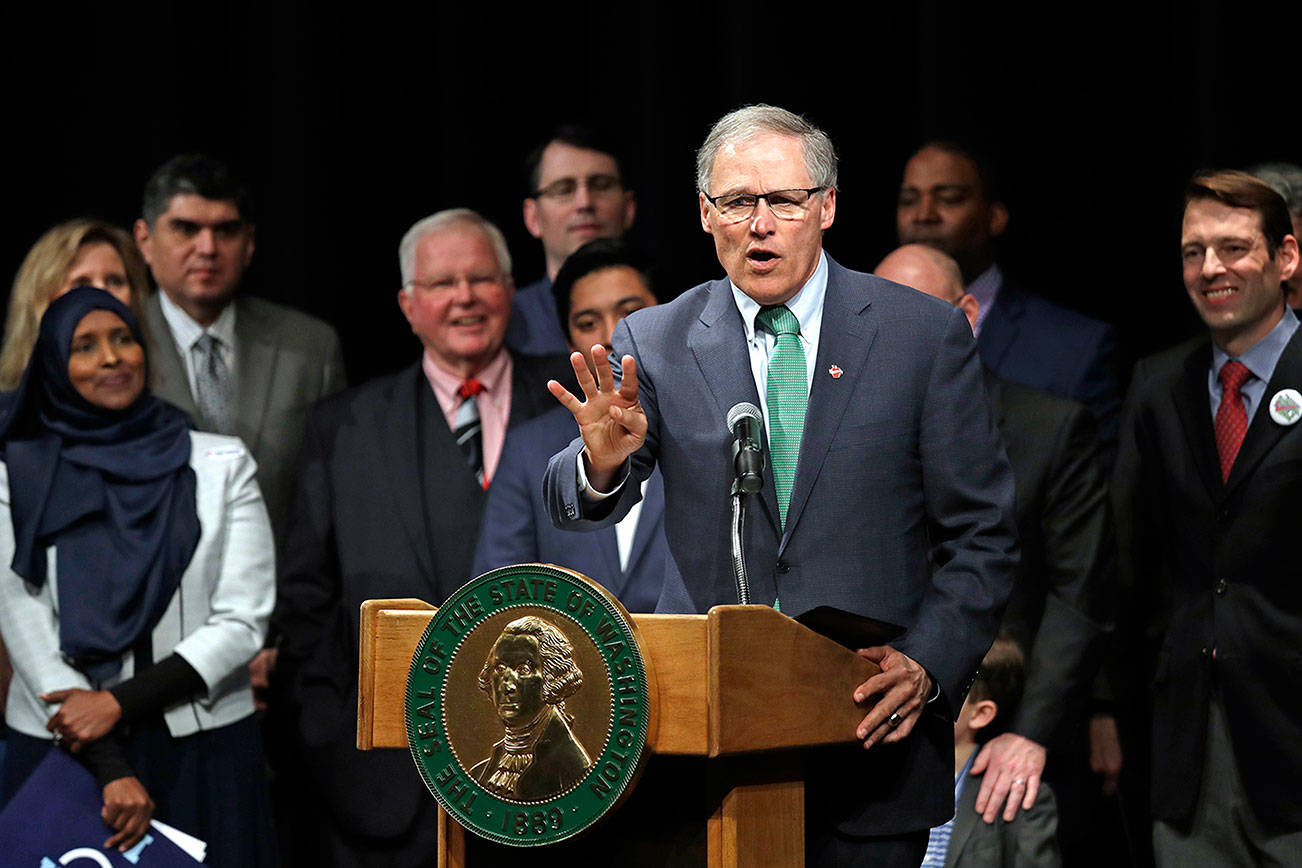 Gov. Inslee signs package of voter access bills
