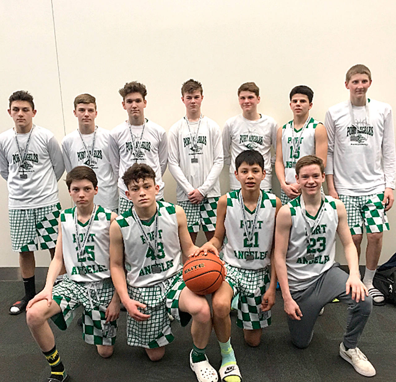 The Port Angeles AAU eighth grade boys basketball team finished second at the Washington Middle School Basketball Championships over the weekend in Spokane. Team members are, front row from left, James Burkhart, Daniel Cable, Quana Wheeler, Michael Soule, and back, Miah Hall, Beckett Jarnigan, Ty Bradow, Blake Williams, Wyatt Dunning, Xander Maestas and John Vaara. Not pictured: coaches Matt Dunning and Jason Wheeler.