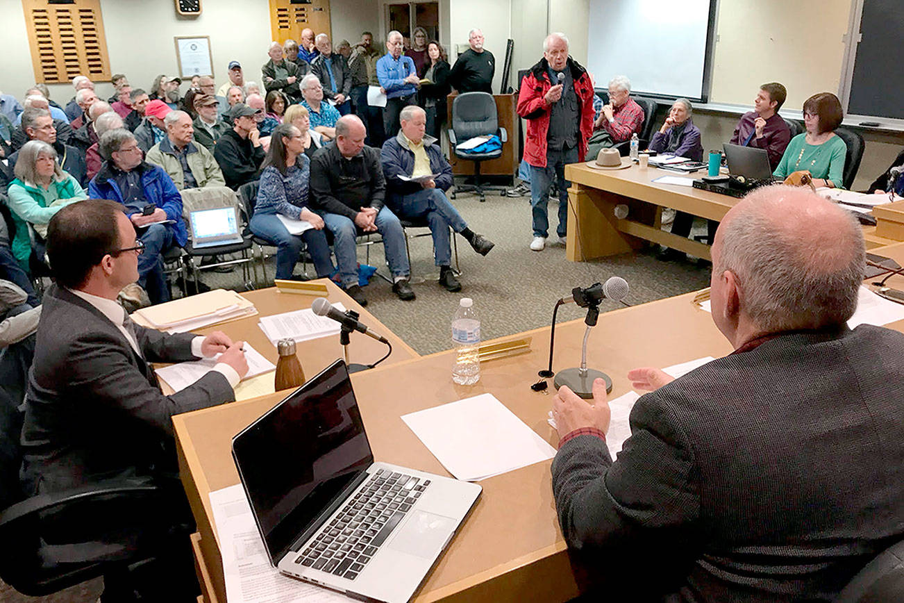 Packed crowd speaks out against selling John Wayne Marina