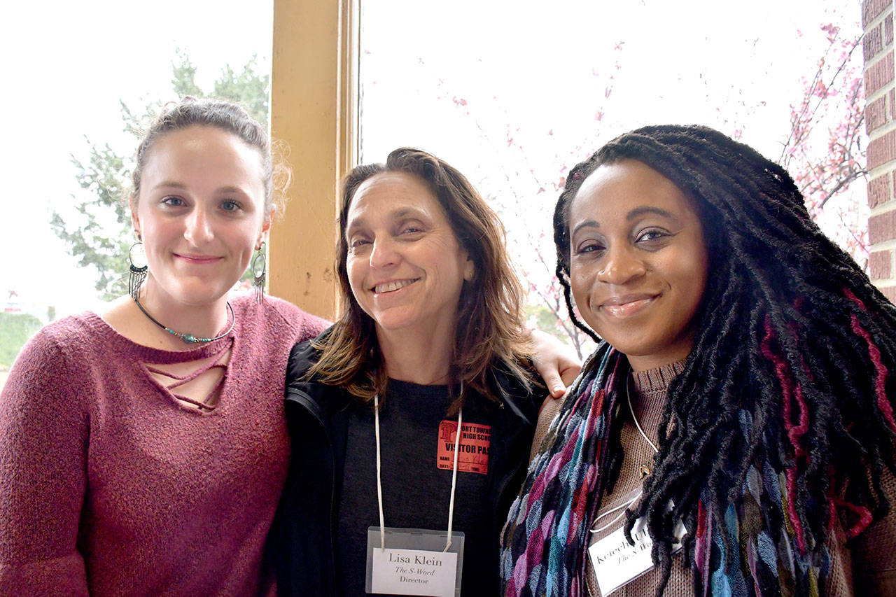 Port Townsend High School student Callay Boire-Shedd, left, presented a program Thursday about suicide prevention to her classmates. Central to the event was the screening of the film “The S Word,” a documentary that focuses on survivors of suicide. Filmmaker Lisa Klein, center, presented her film to about 150 students, and Kelechi Ubozoh, one of the featured subjects, was on hand to tell her story. (Jeannie McMacken/Peninsula Daily News)