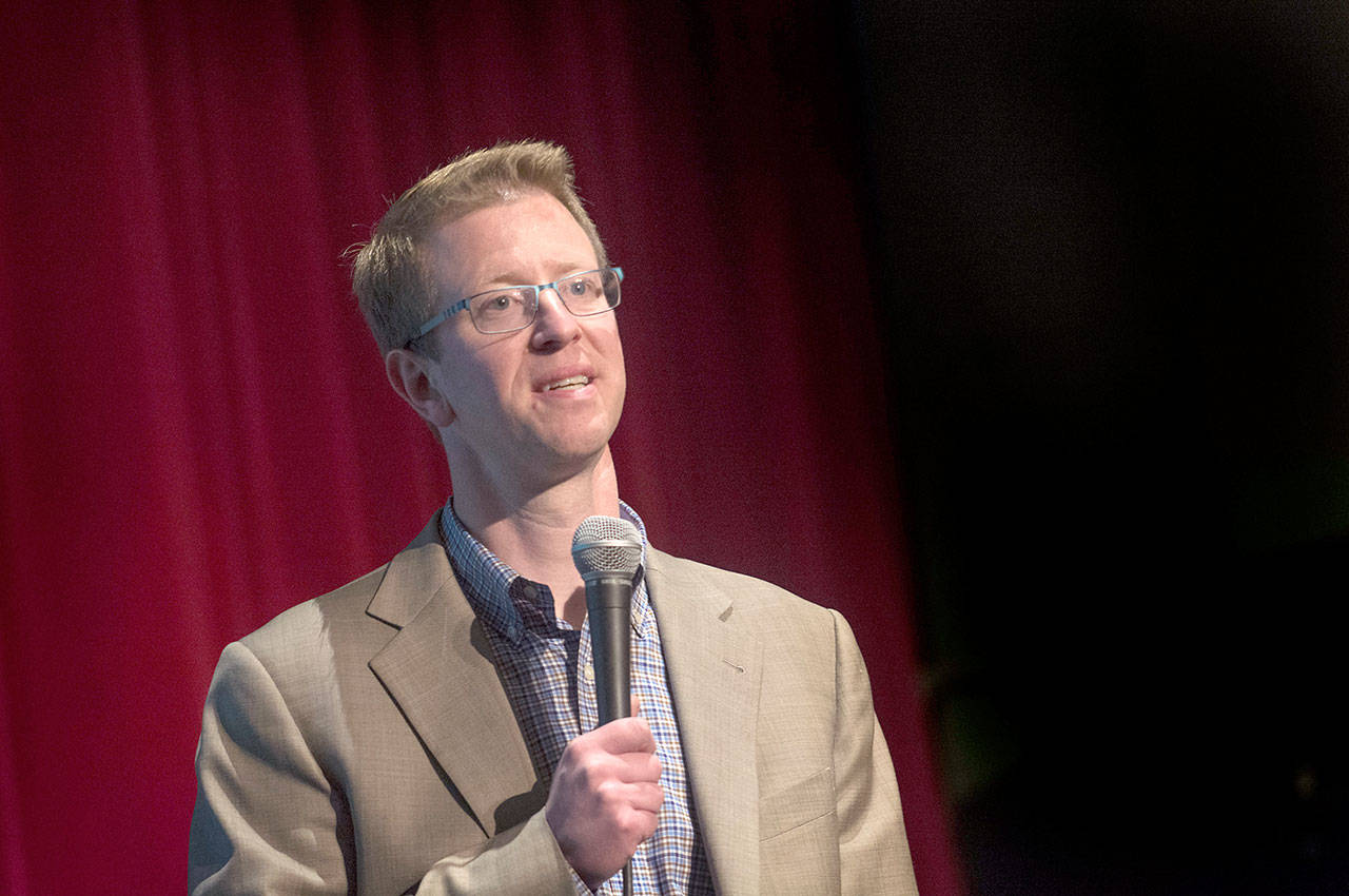 U.S. Rep Derek Kilmer responds to questions during his town hall at Peninsula College on Wednesday. (Jesse Major/Peninsula Daily News)