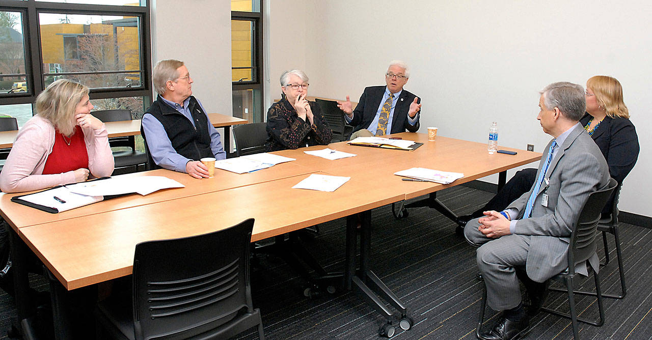 Educators and health care officials gather for a discussion on the demand for qualified nurses Friday at Peninsula College in Port Angeles. Included in the presentation were, from left, Caitlin Harrison, chief human resources officer for Jefferson Healthcare; state Rep. Steve Tharinger; Sharon Buck, college vice president of instruction; college president Luke Robins; Eric Lewis, CEO of Olympic Medical Center; and Mia Boster, collage dean of instructional services. (Keith Thorpe/Peninsula Daily News)