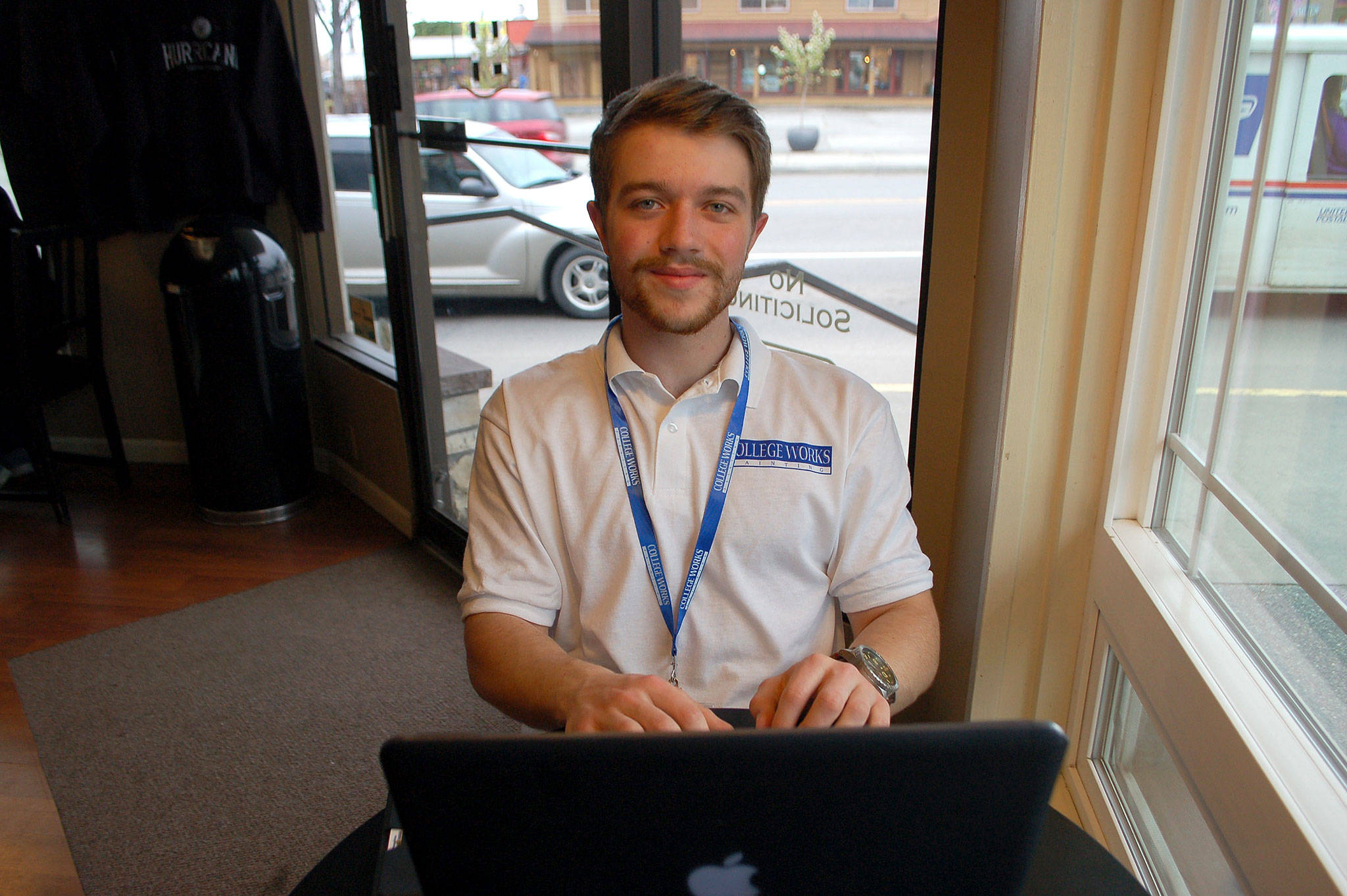 <strong>Erin Hawkins</strong>/Sequim Gazette Sequim High School graduate Christian Davis, 18, earned an internship with College Works Painting where he will gain skills in managing a business as a summer intern.