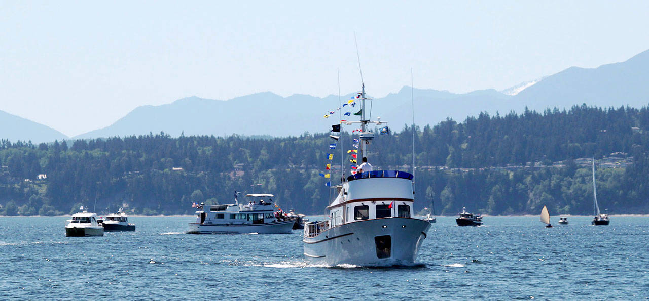 Boats of all shapes and sizes turned out last year for the annual boat parade which kicks off the Port Townsend Yacht Club boating season. (Port Townsend Yacht Club)