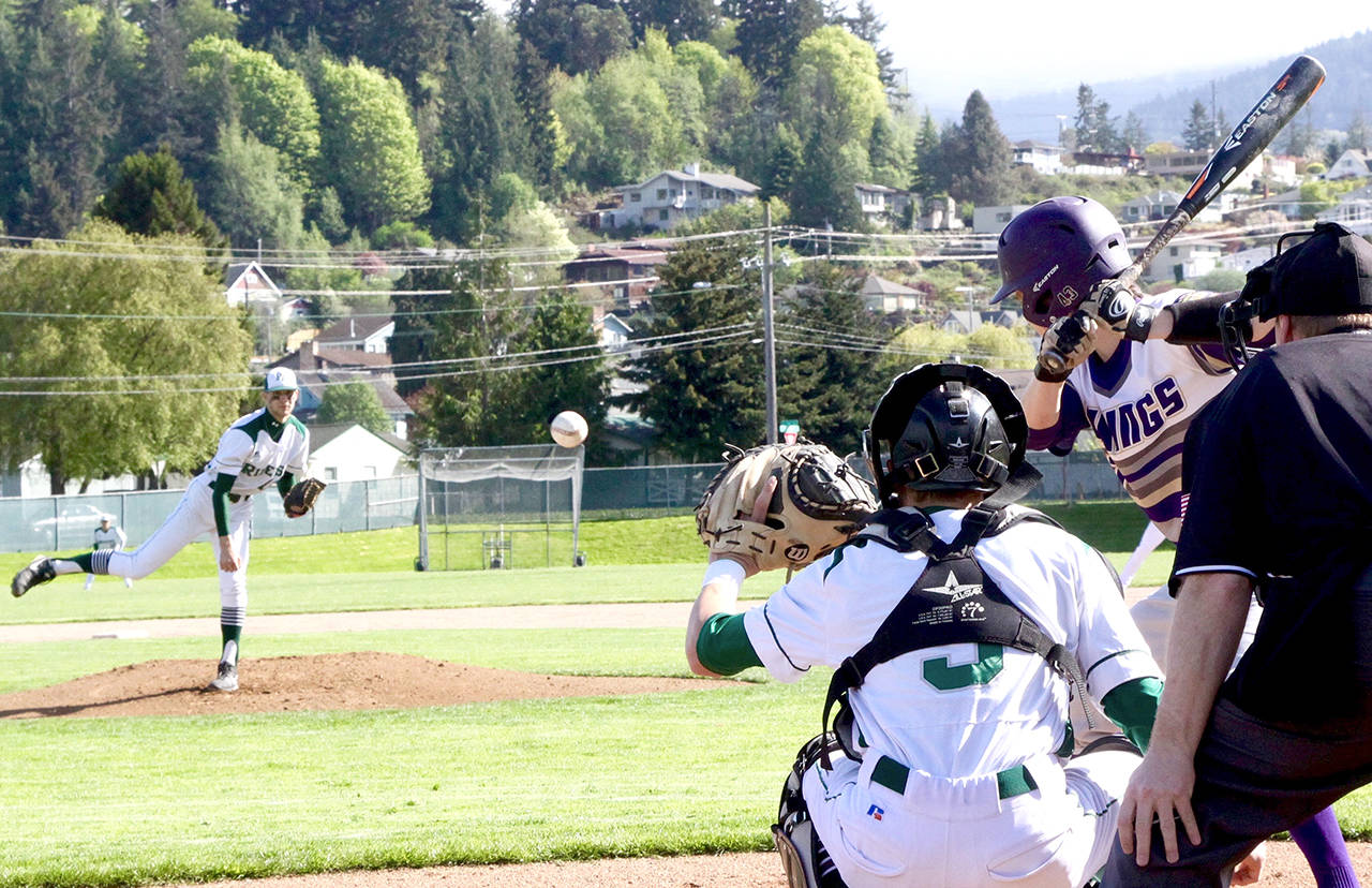 Port Angeles pitcher Colton McGuffey throws a strike to Riders’ catcher Joel Wood during the Roughriders’ 9-8 win over North Kitsap. McGuffey went 2 for 5 with an RBI double and Wood was 3 for 4 with the game-tying RBI double and scored the game-winning run as Port Angeles rallied to win the Olympic League 2A Division title. Dave Logan/for Peninsula Daily News