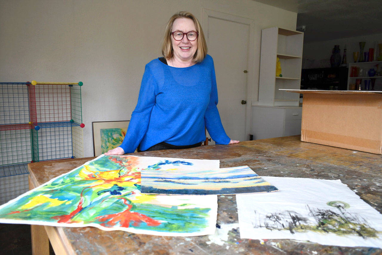 Northwind Arts Center Board President Thya Merz and a team of volunteers have been working to gather the art, furnishings and personal items of the center’s co-founder, the late Jeanette Best, for an estate sale to be held Friday and Saturday from 9:30 a.m. to 5 p.m. at Best’s waterfront home on Mats Mats Bay. (Jeannie McMacken/Peninsula Daily News)