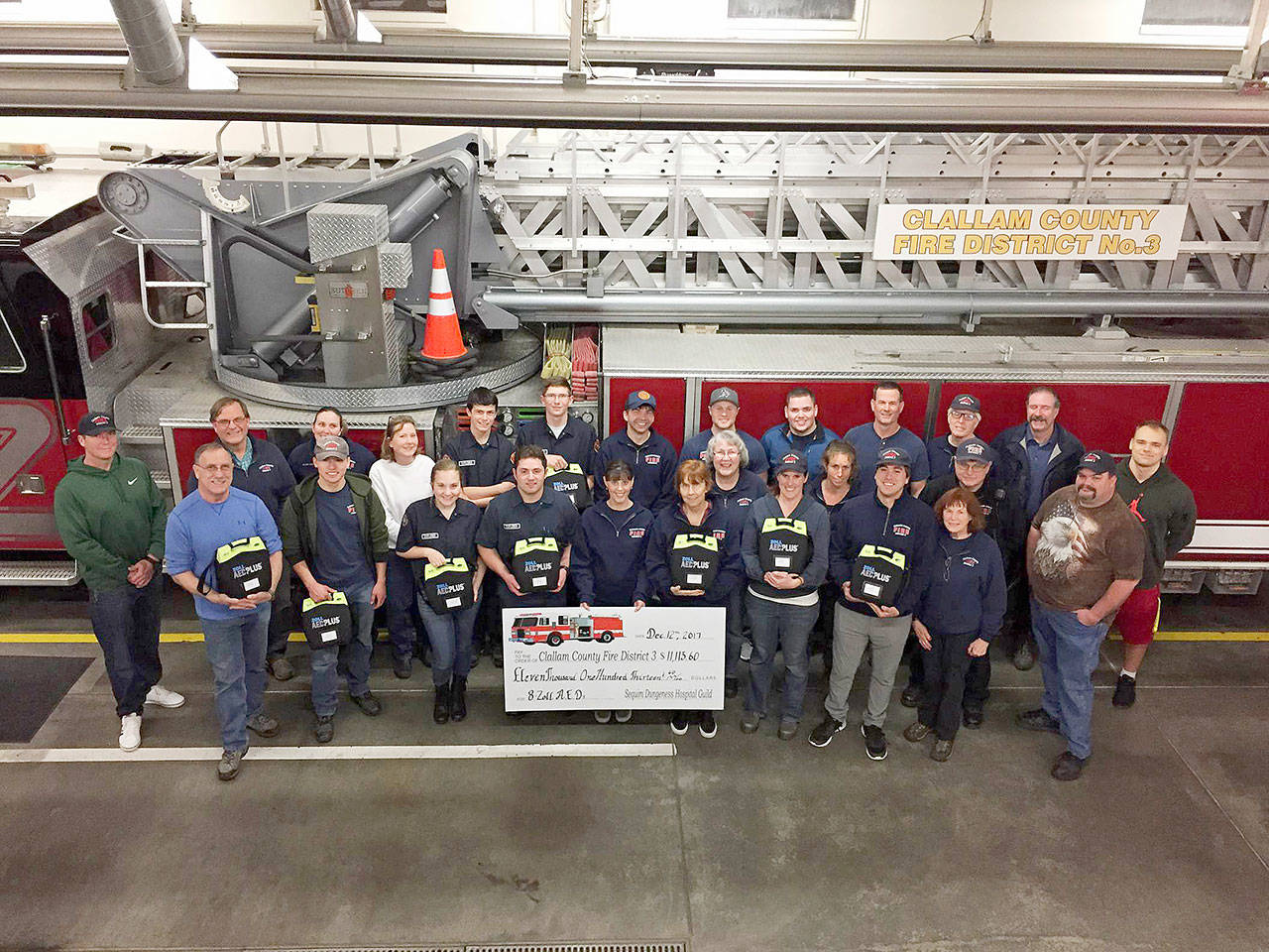 Fire District 3 personnel are equipped with eight more automatic external defibrillators after receiving a donation of more than $11,000 from the Sequim-Dungeness Hospital Guild.