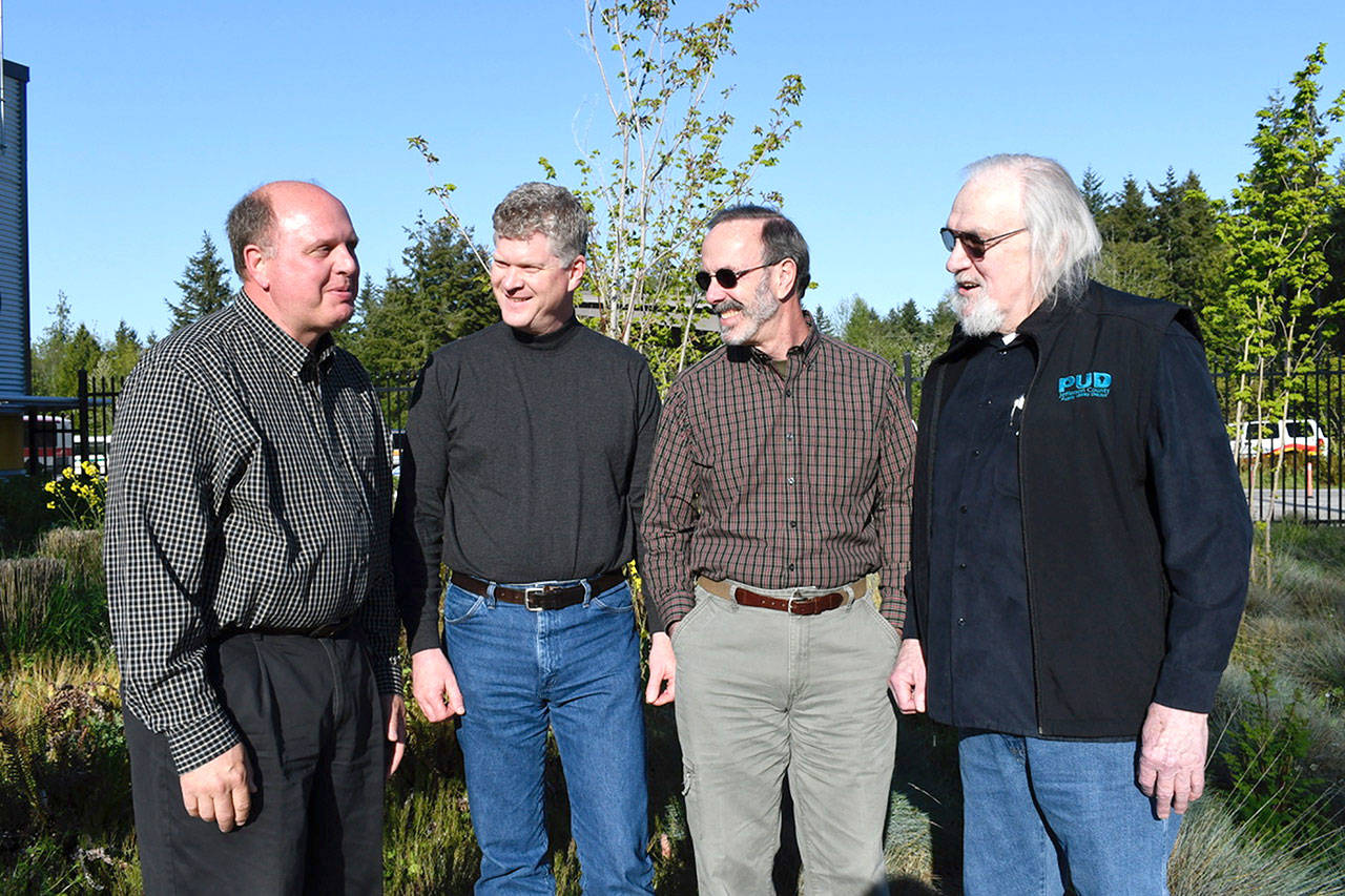 Larry Dunbar met with commissioners and the public Tuesday in his new role as Jefferson County PUD general manager. Shown from left are Dunbar and commissioners Jeff Randall, Kenneth Collins and Wayne King. (Jeannie McMacken/ Peninsula Daily News)