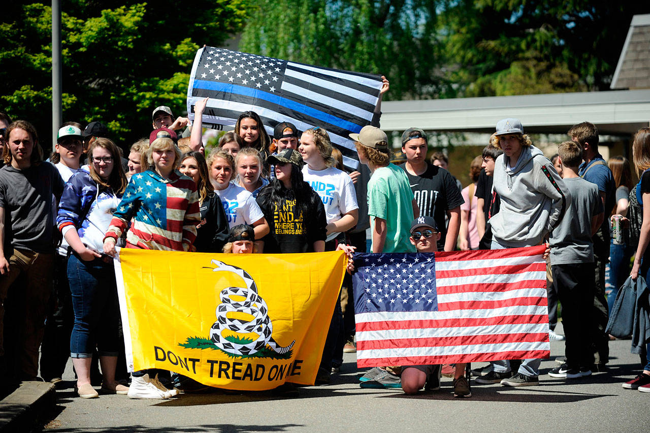 Sequim High school students gathered at the flagpole on campus for 16 minutes to participate in a national walkout “Stand for the Second” supporting the Second Amendment and the right to bear arms. (Erin Hawkins/Olympic Peninsula News Group)