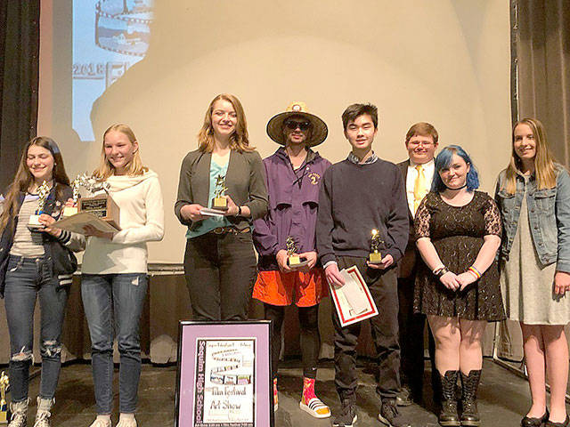 Award winners at the 2018 Sequim Education Foundation Film Festival include, from left, Maddy Dietzman, Melissa Porter, Madeline Patterson, Alec Shingleton, Raymond Lam, Jackson Lindorfer, Abygail Mundy and Kalli Wiker. (James Shingleton)