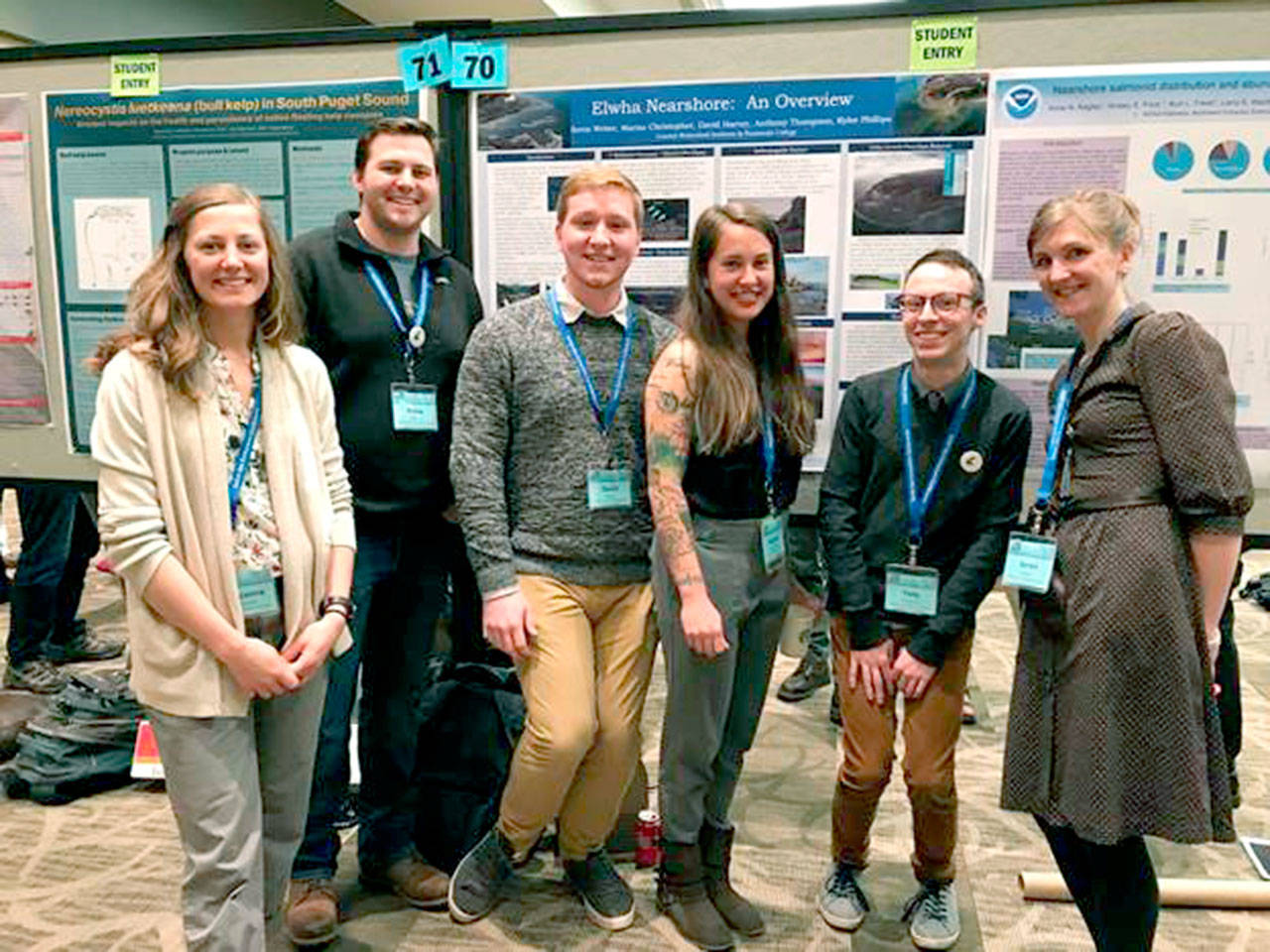 Coastal Watershed Institute/Peninsula College interns, from left, Breyanna Waldsmith, Rylee Phillips, David Harvey, Marissa Christopher, Tony Thompson and Seren Weber, in front of their Elwha nearshore overview poster honored at the 2018 Salish Sea Ecosystem conference.
