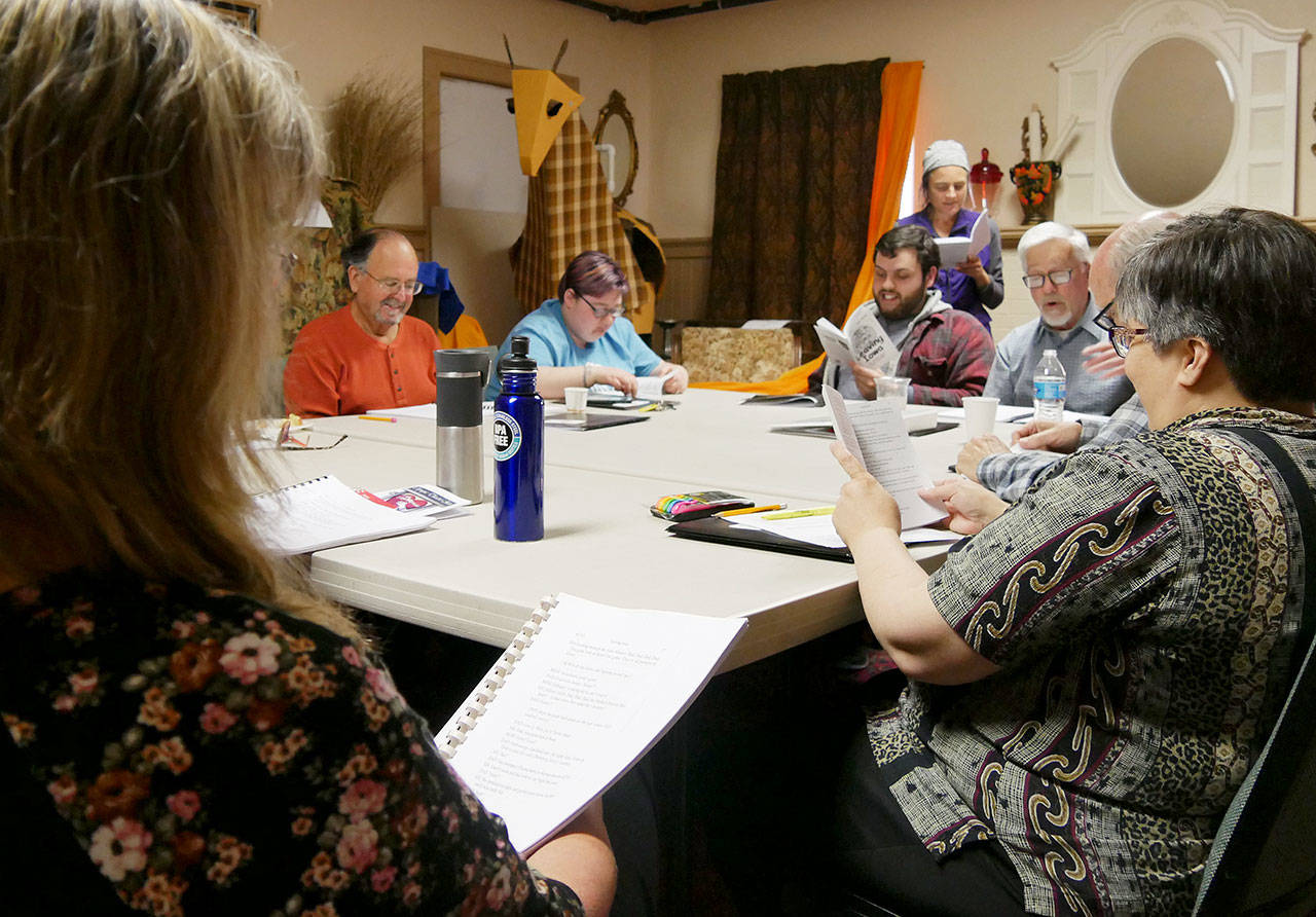 The cast of “Leaving Iowa” rehearses a scene for the upcoming Olympic Theatre Arts play. (Olympic Theatre Arts)