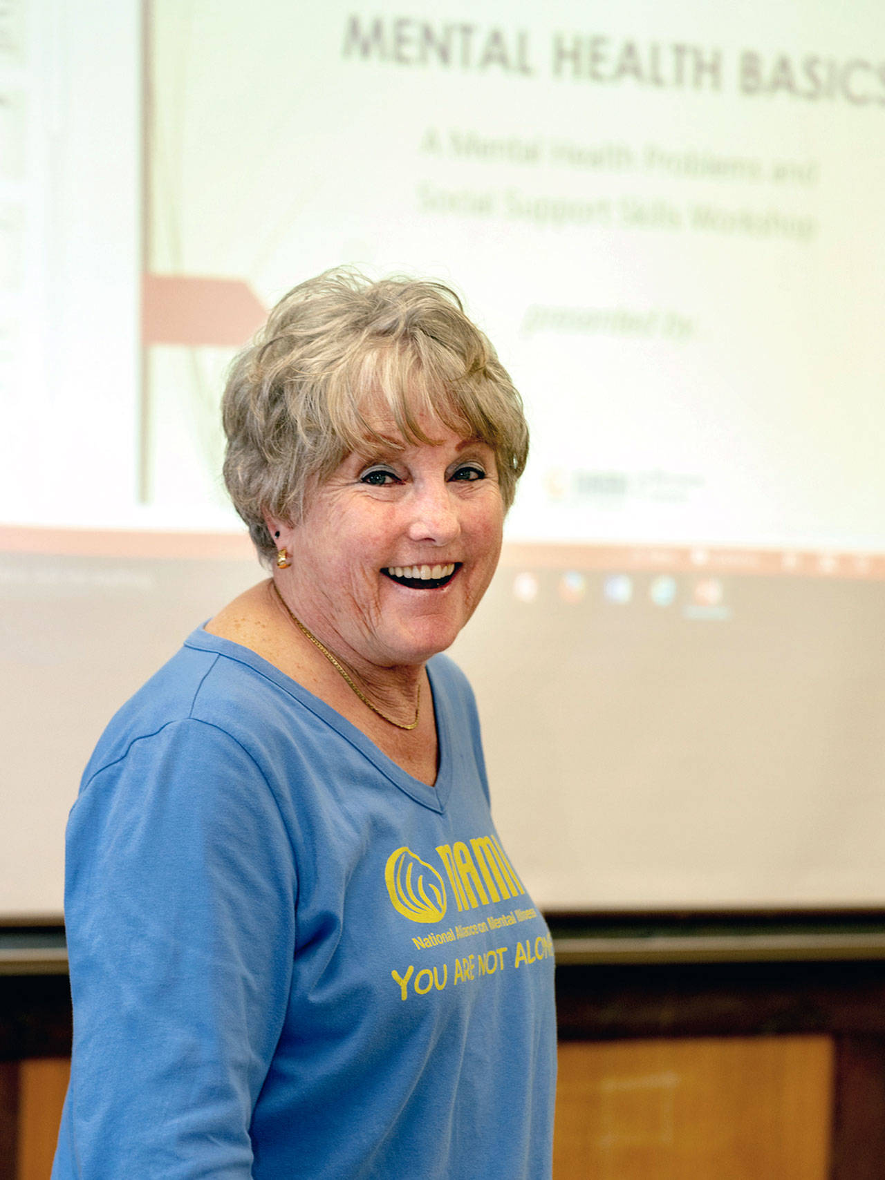 Valerie Phimister preparing to give a talk on Mental Health Basics. (Steve Mullensky/for Peninsula Daily News)