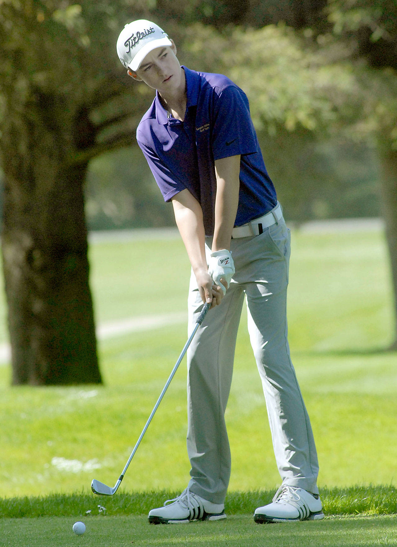 Sequim’s Paul Jacobsen looks down the fairway during the Olympic League Tournament in May at The Cedars at Dungeness. Keith Thorpe/Peninsula Daily News